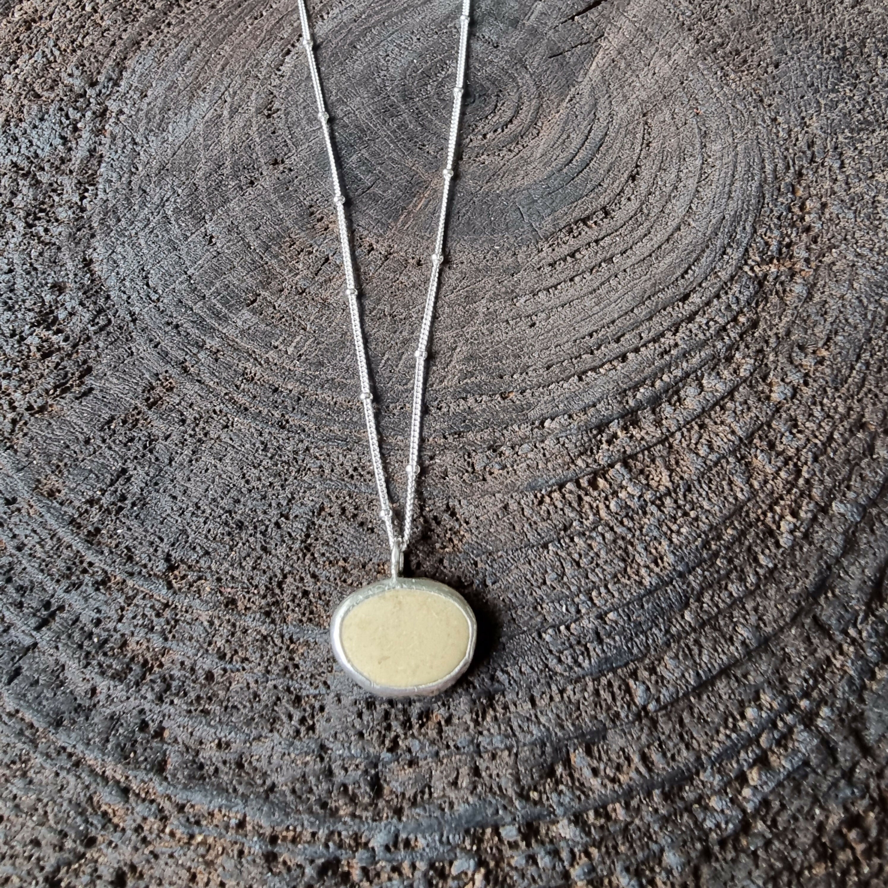Beach Stone and Silver Pendant