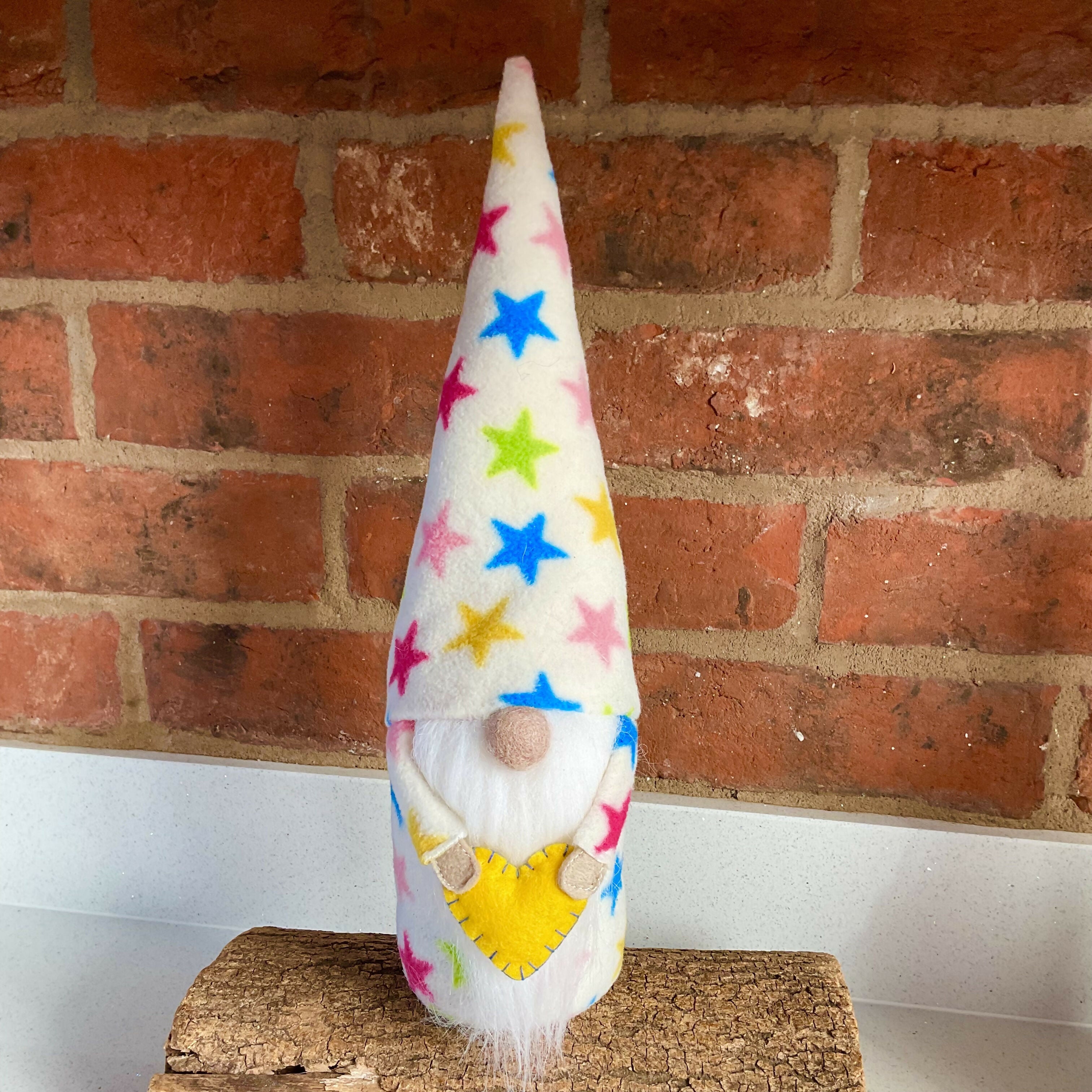 Celebration Gnome Decoration, Handmade Gonk with a Pointy Fleece Hat Covered in Stars, Holding a Yellow Heart