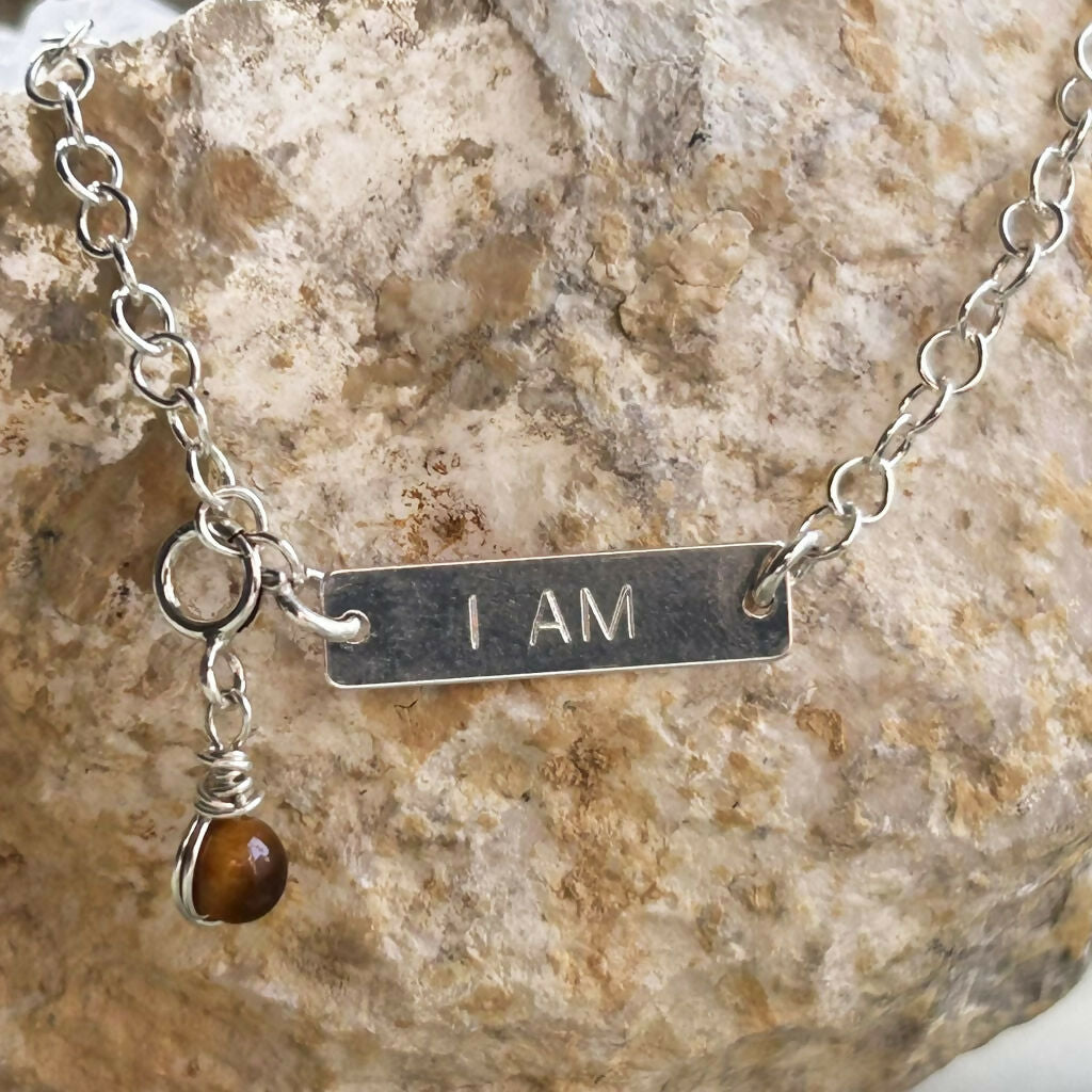 Handmade Sterling Silver 'I Am Strong' Tiger's Eye Charm Bracelet