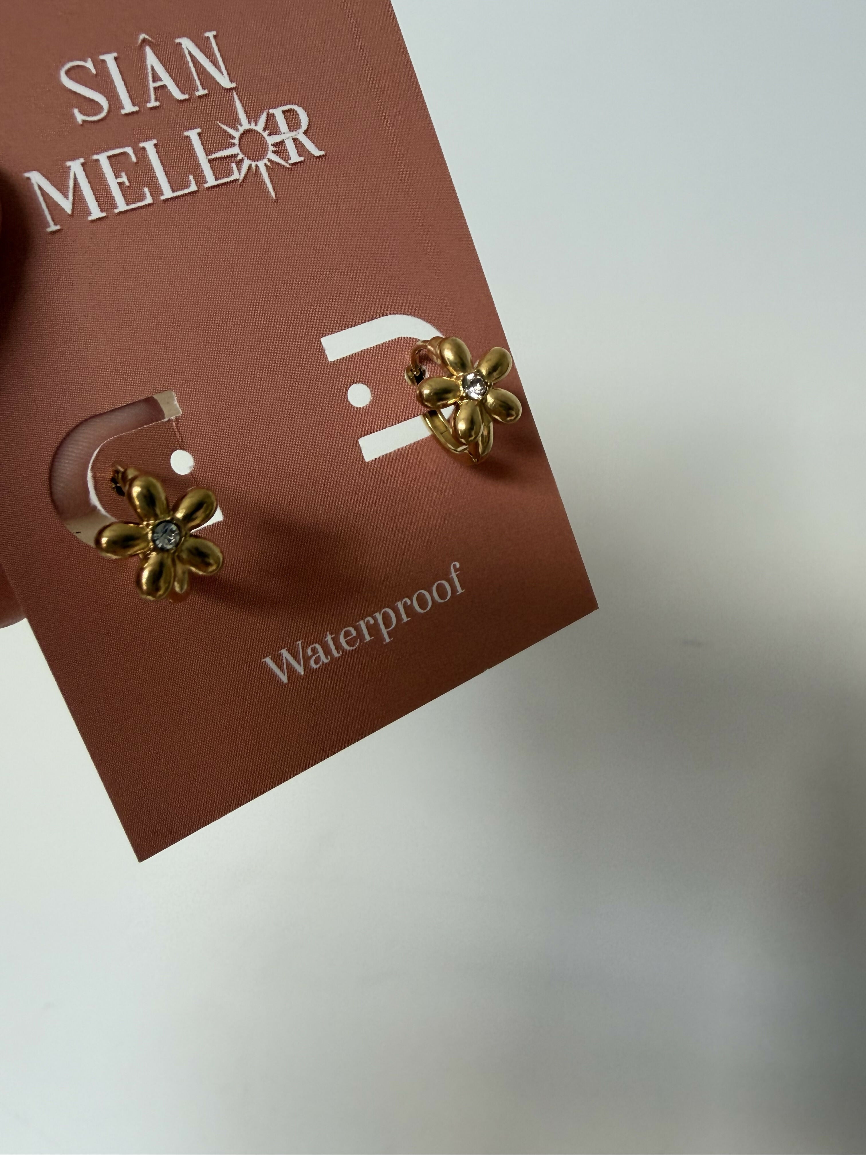 gold flower huggie hoops
