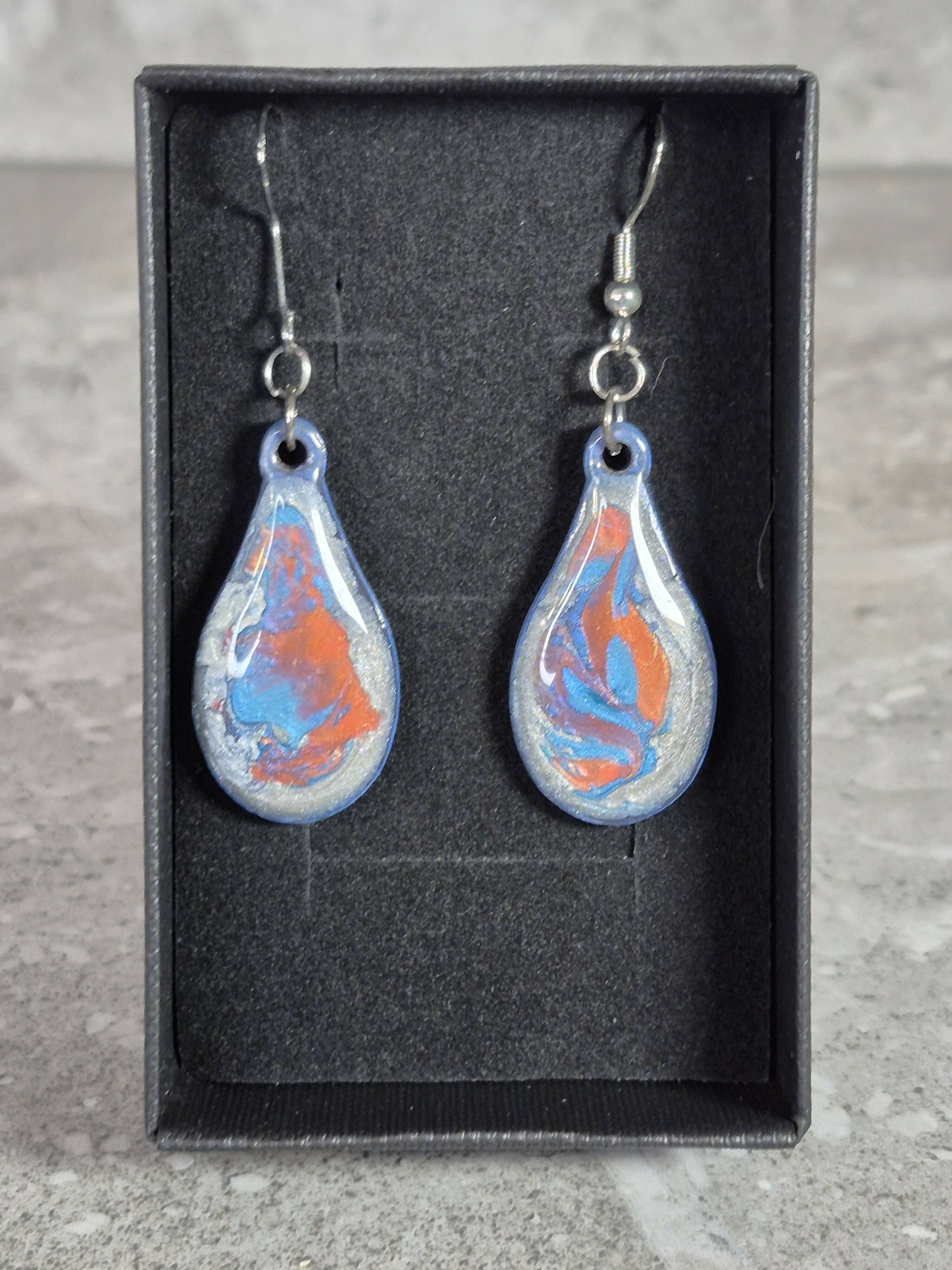 Handcrafted Teardrop Earrings With Blue, Silver And Red Colours