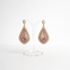 Floral Teardrop Drop Earrings with Rhinestone Border and Opal Glitter Detail in Nude