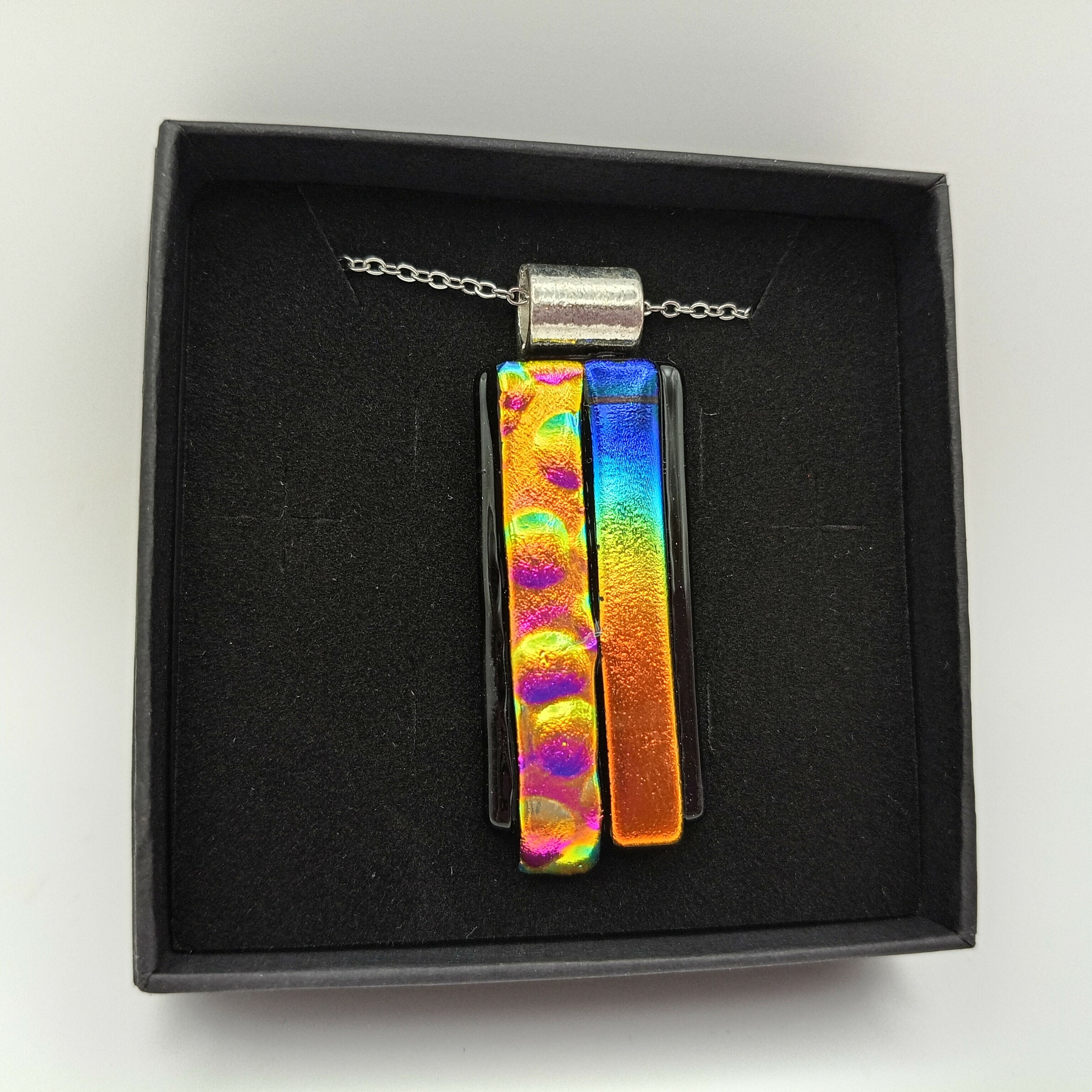 Rainbow and Gold and Pink Bubble Dichroic Pendant on Black Base
