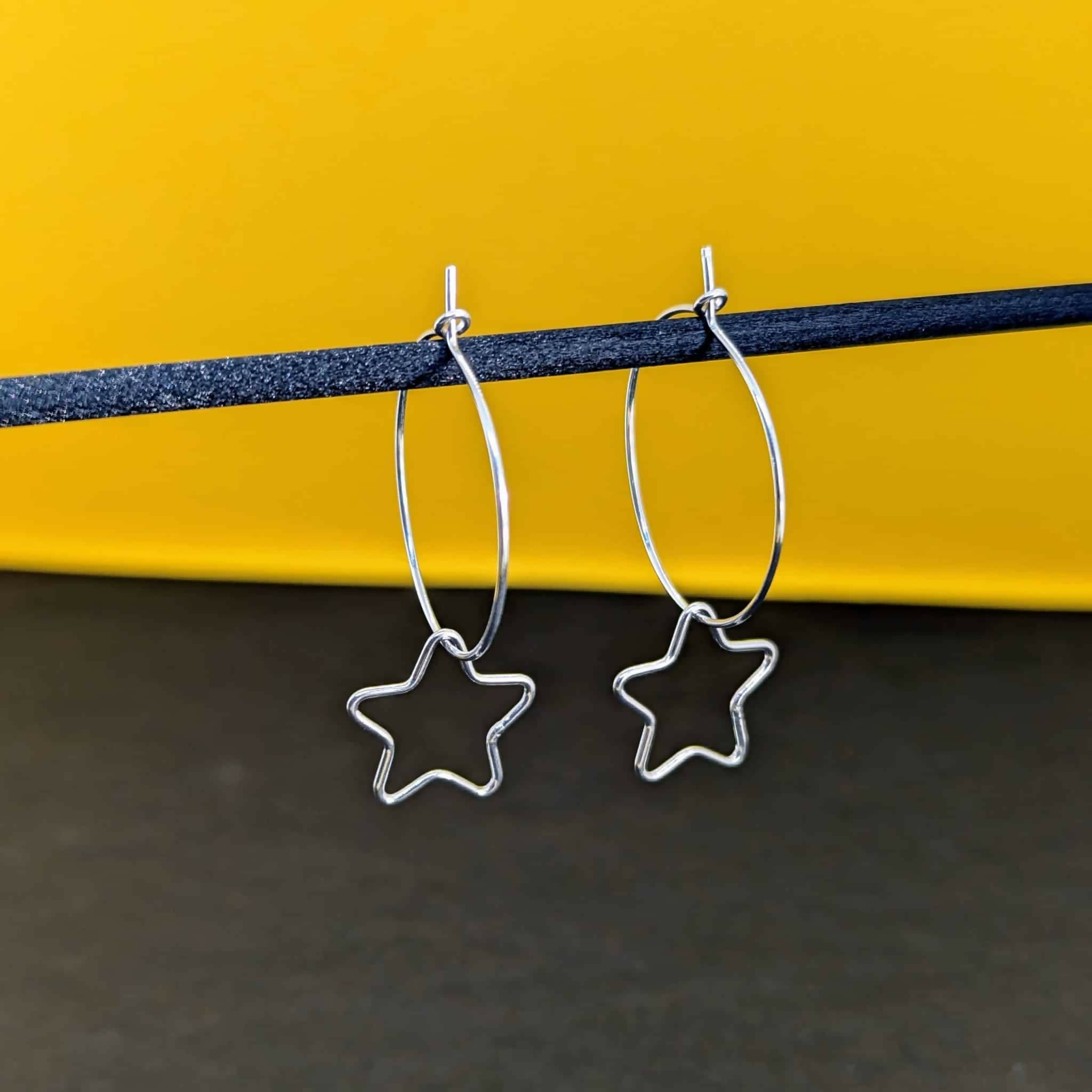 Starlight’ Sterling Silver Small Star Hoop Earring