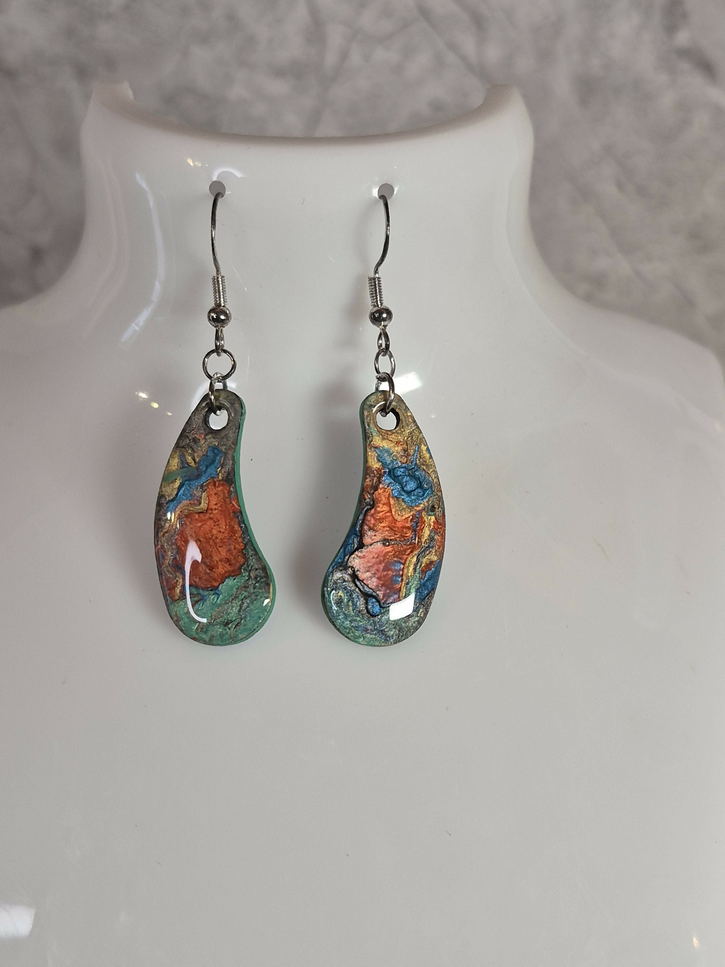 Handcrafted teardrop shaped multicoloured earrings.