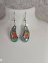 Handcrafted teardrop shaped multicoloured earrings.
