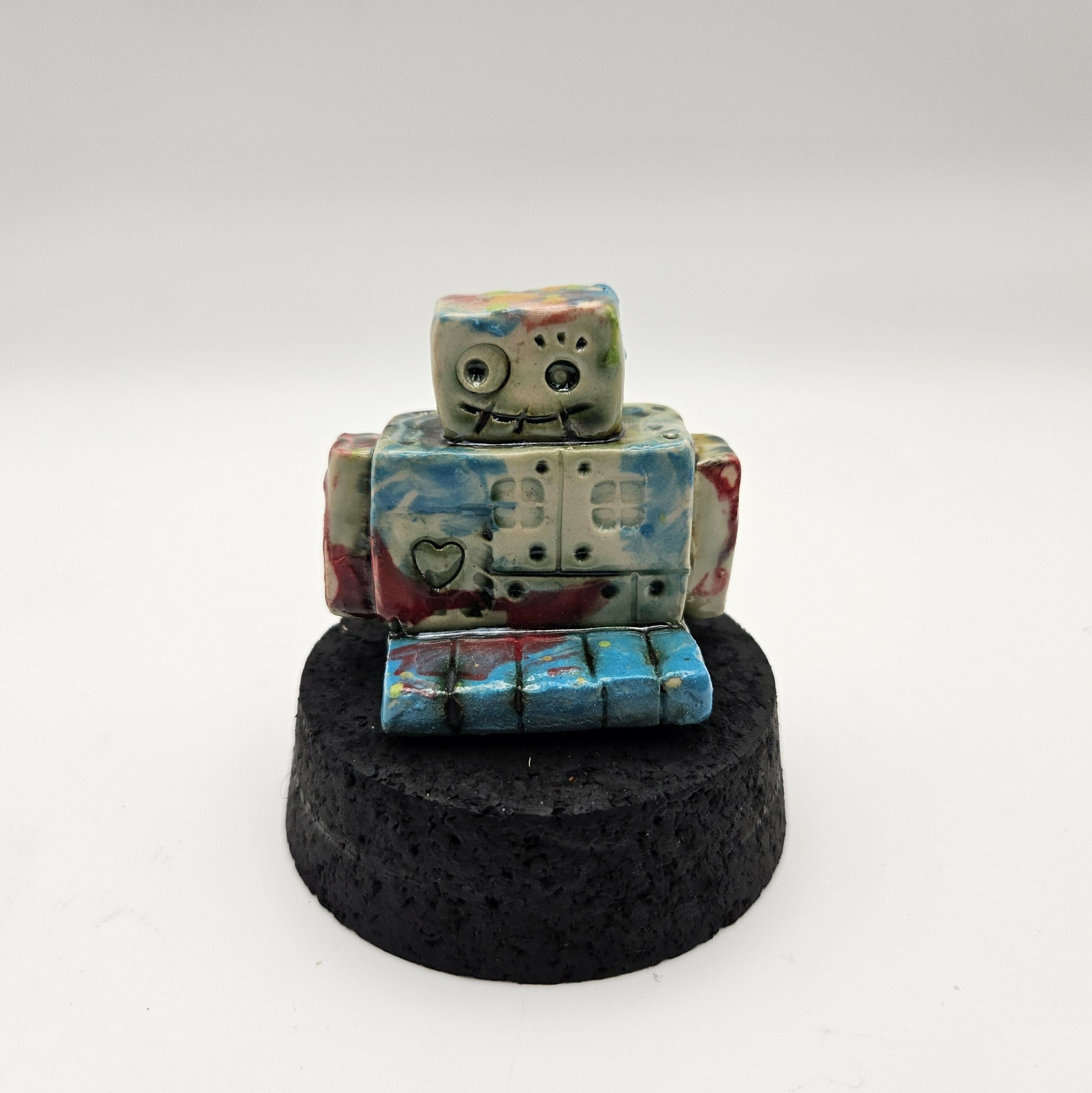 QUIKRY CERAMIC 'MINIBOTS' IN A GLASS CLOCHE