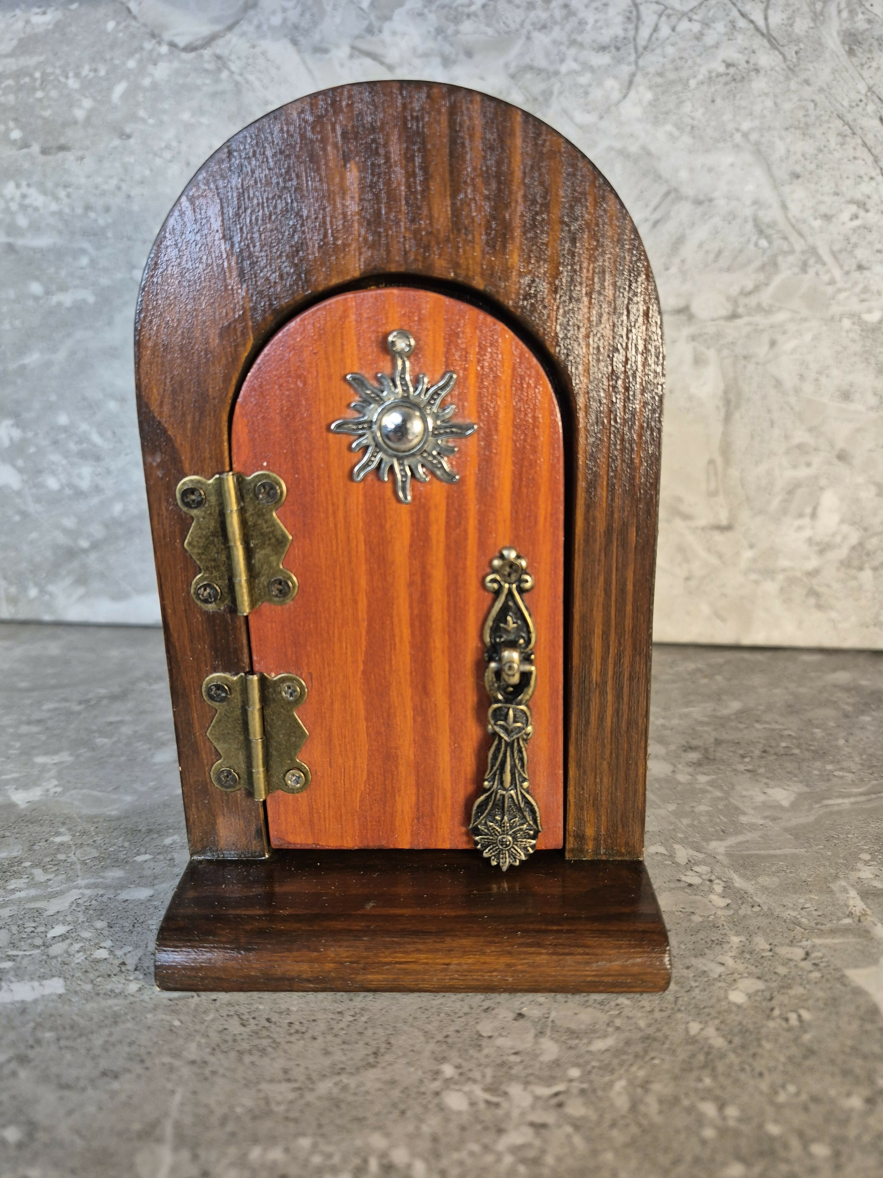 Handcrafted wooden opening fairy door