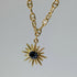 Gold Starburst Necklace with Deep Purple Stone on Gold Plated Deco Oval Chain