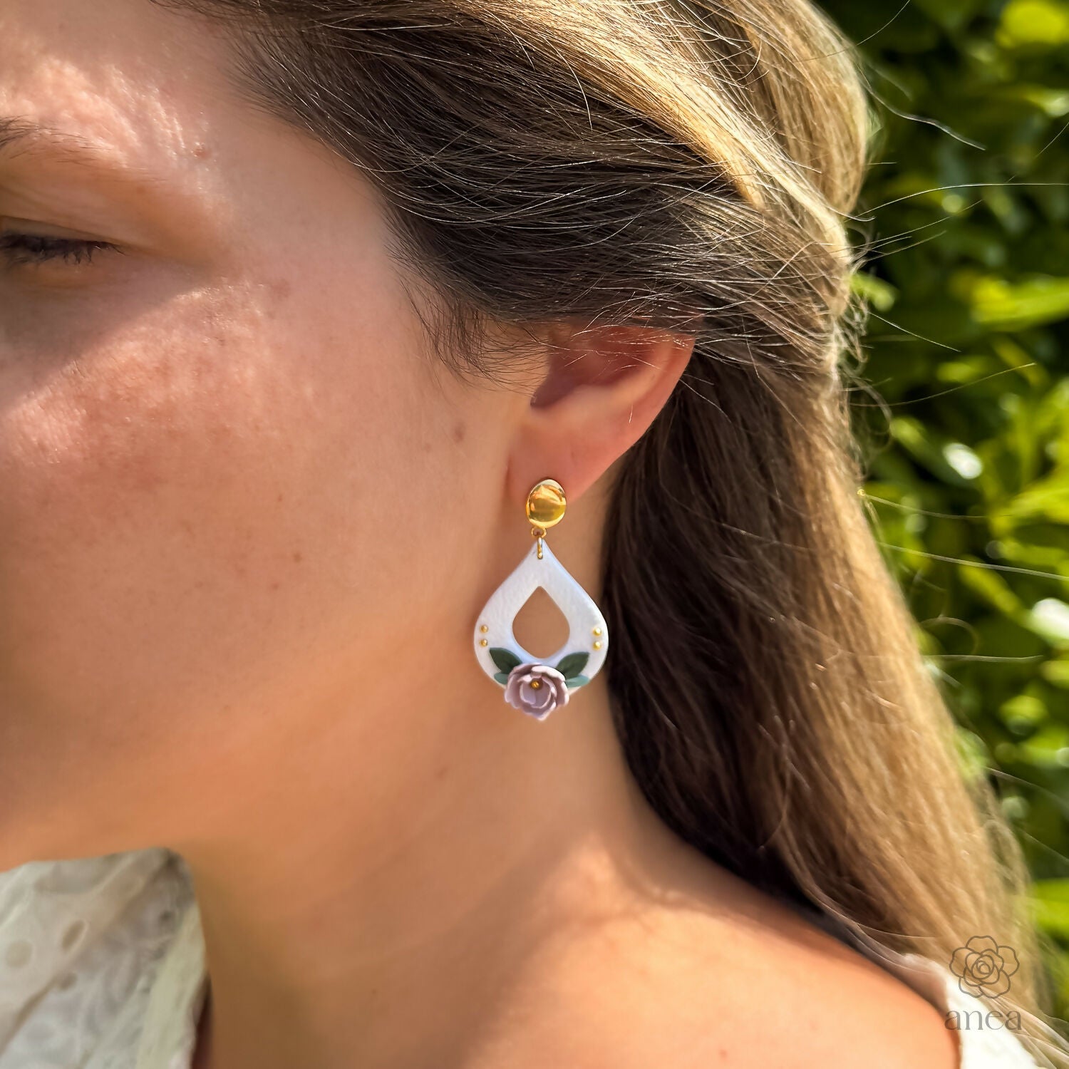 Floral Drop Earrings with Embossed Texture and Gold Detail in Pastel Pink