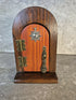 Handcrafted wooden opening fairy door