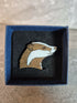 Handcrafted Walnut veneered badger head pin.
