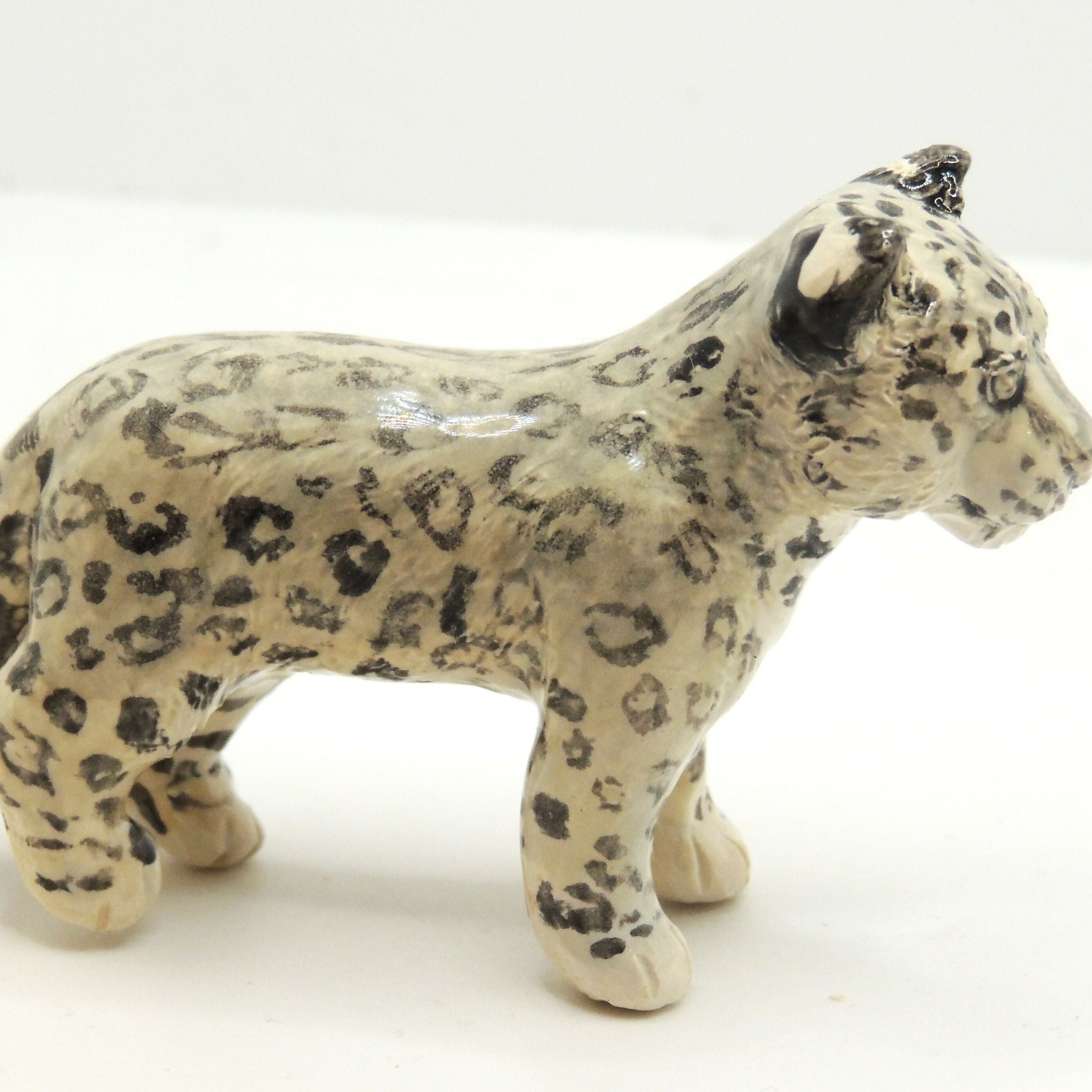 Ceramic Snow Leopard sculpture