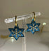 STAR HOOP WITH GOLD ENGRAVED SNOWFLAKE DESIGN