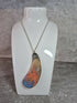 Unique Hand Crafted Tear Drop Shaped Pendant With a Fiery Textured Pattern