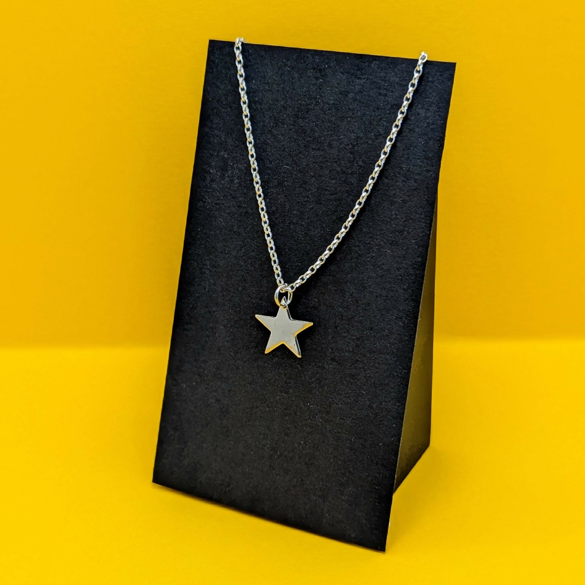 ‘Fallen Star’ Sterling Silver Small Polished Star Pendant