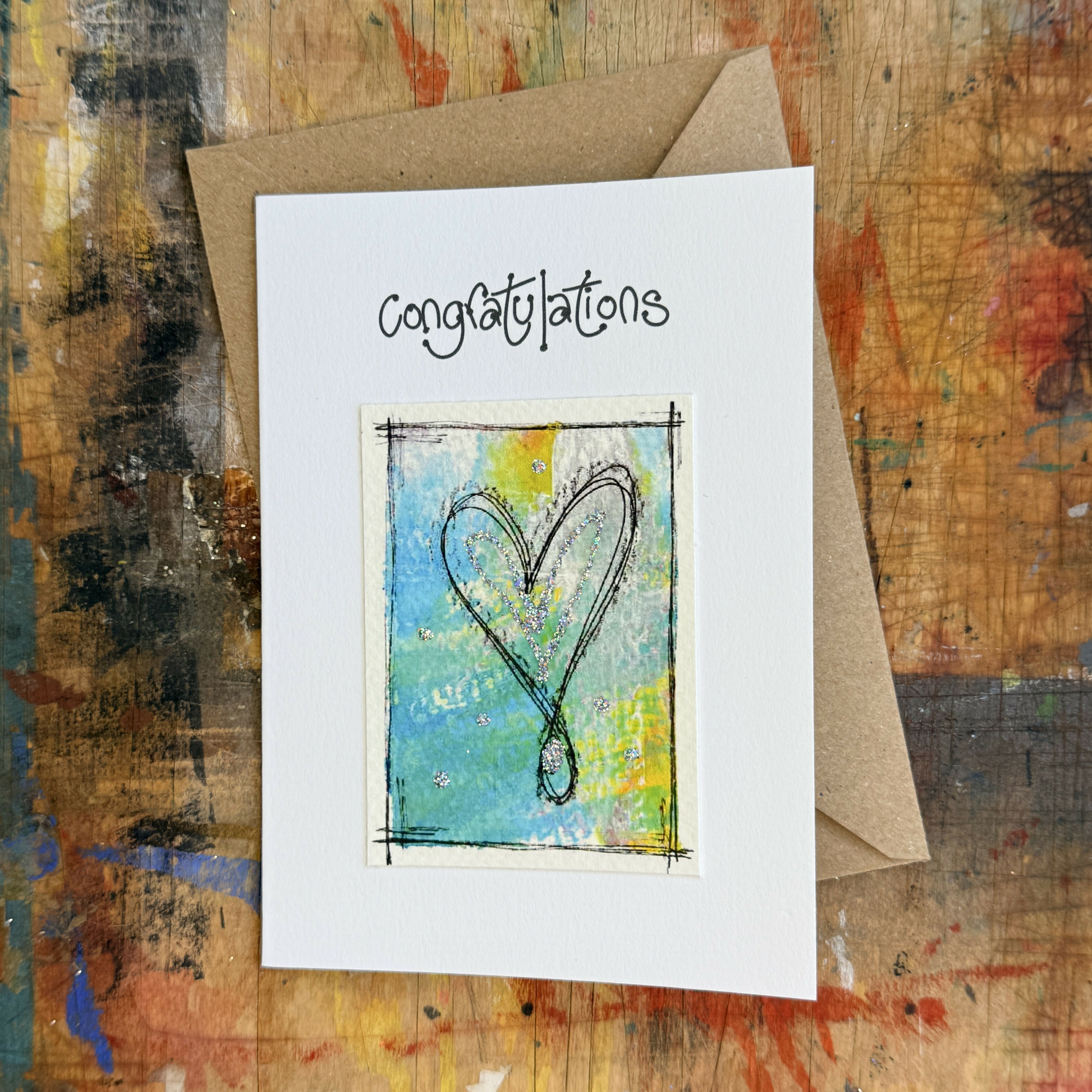 Abstract Sparkle Heart Congratulations Card in Blue