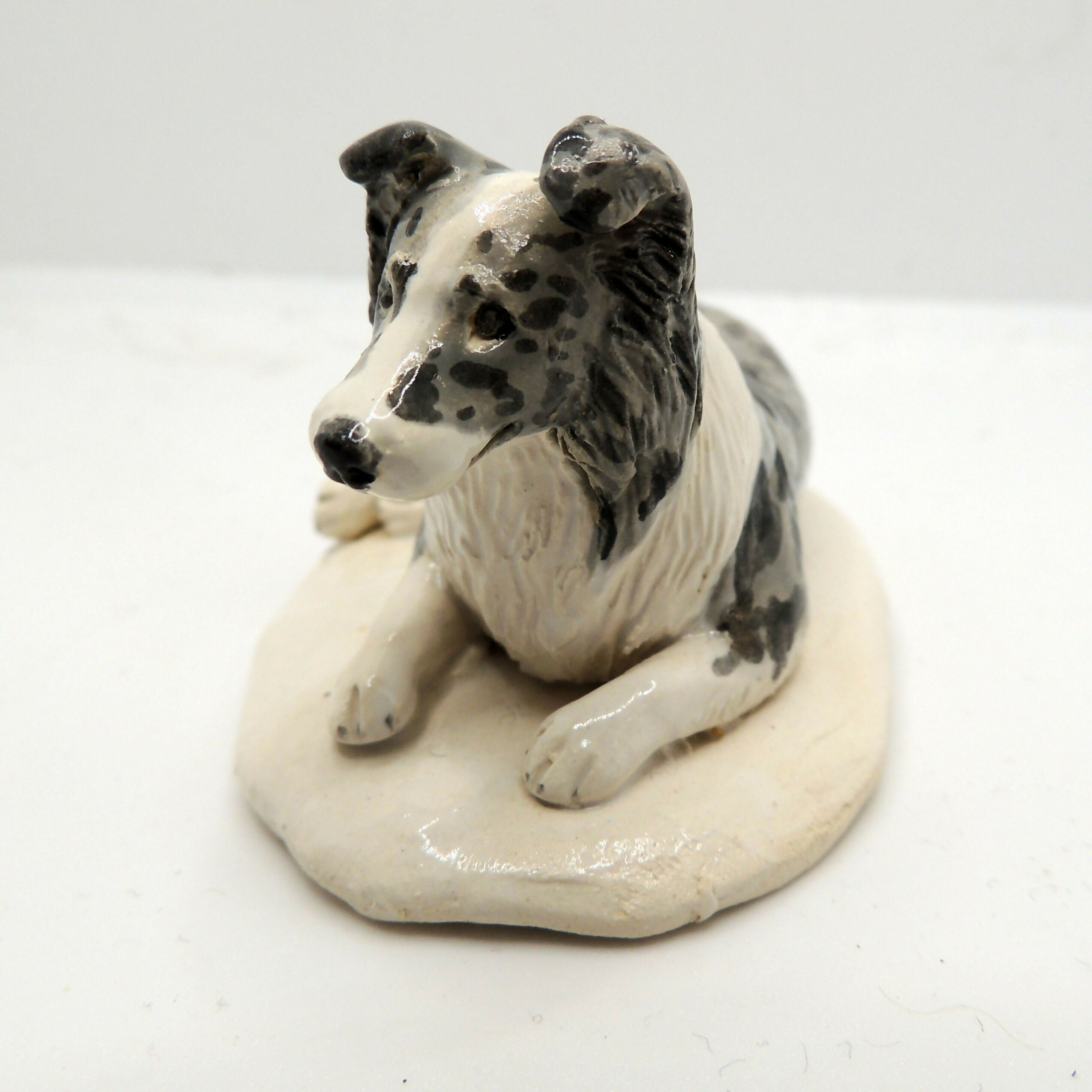 Ceramic Shetland Sheepdog (Sheltie) sculpture, blue merle