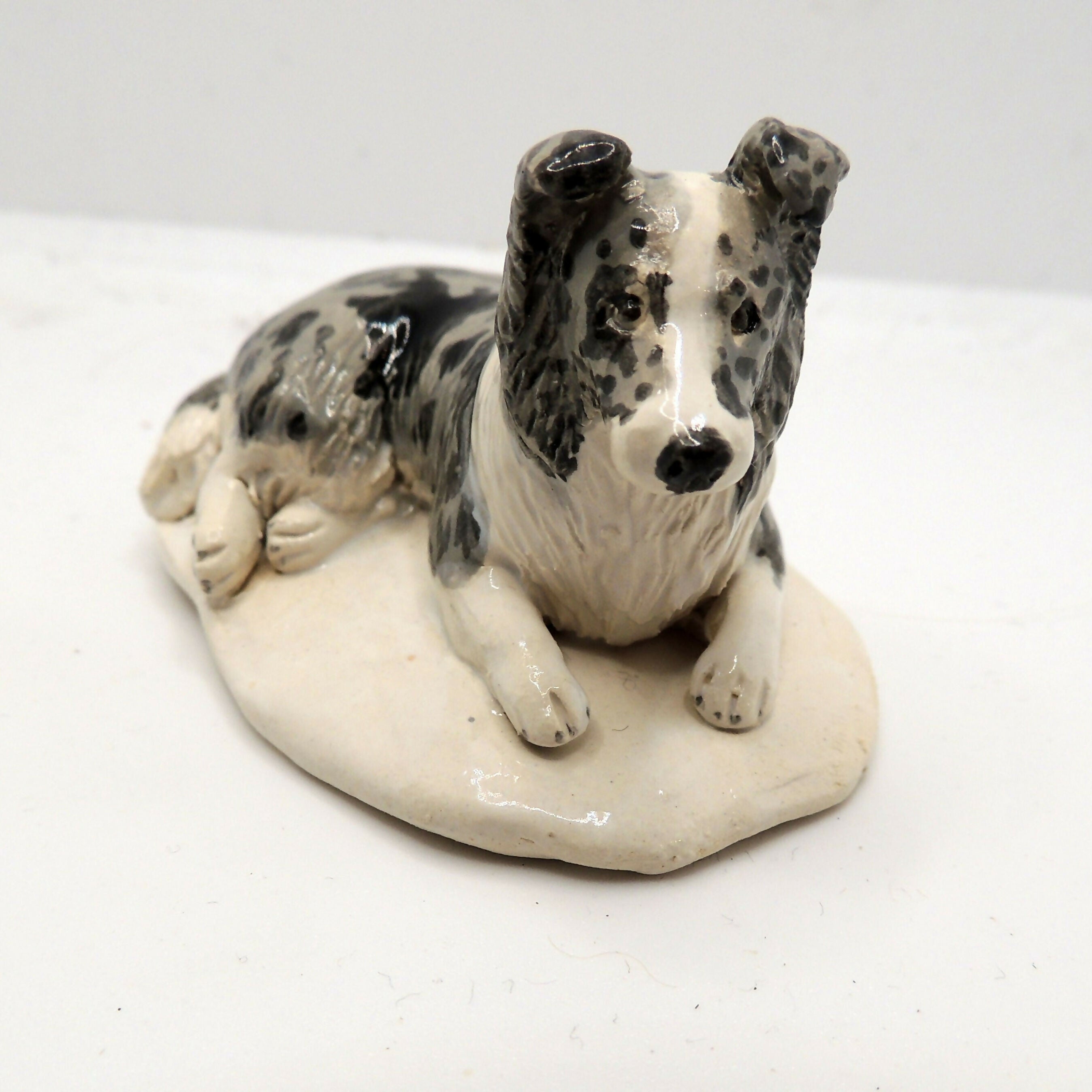 Ceramic Shetland Sheepdog (Sheltie) sculpture, blue merle
