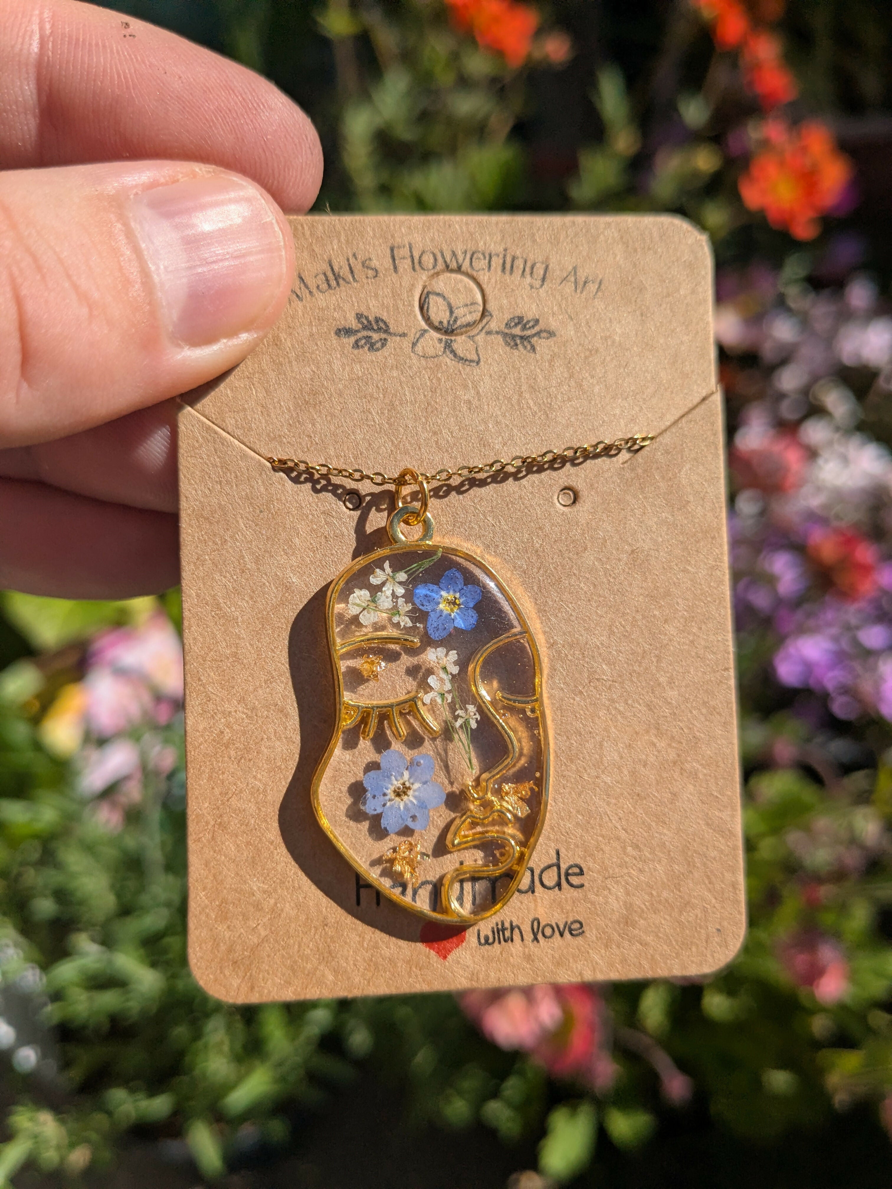 FORGET ME NOT LADY FACE NECKLACE