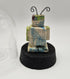 QUIKRY CERAMIC 'MINIBOTS' IN A GLASS CLOCHE