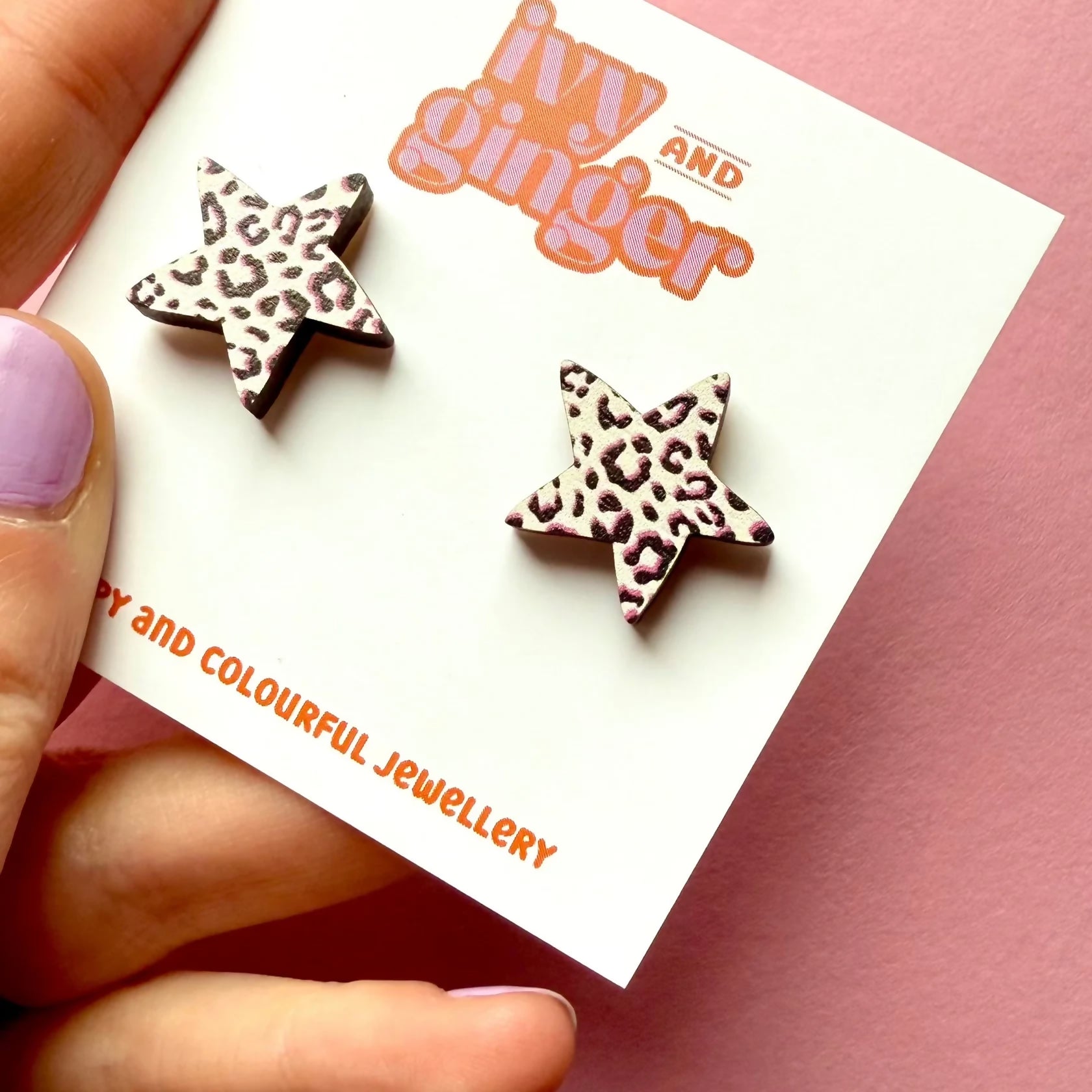 Large_black_white_and_pink_leopard_print_star_studs_close_up