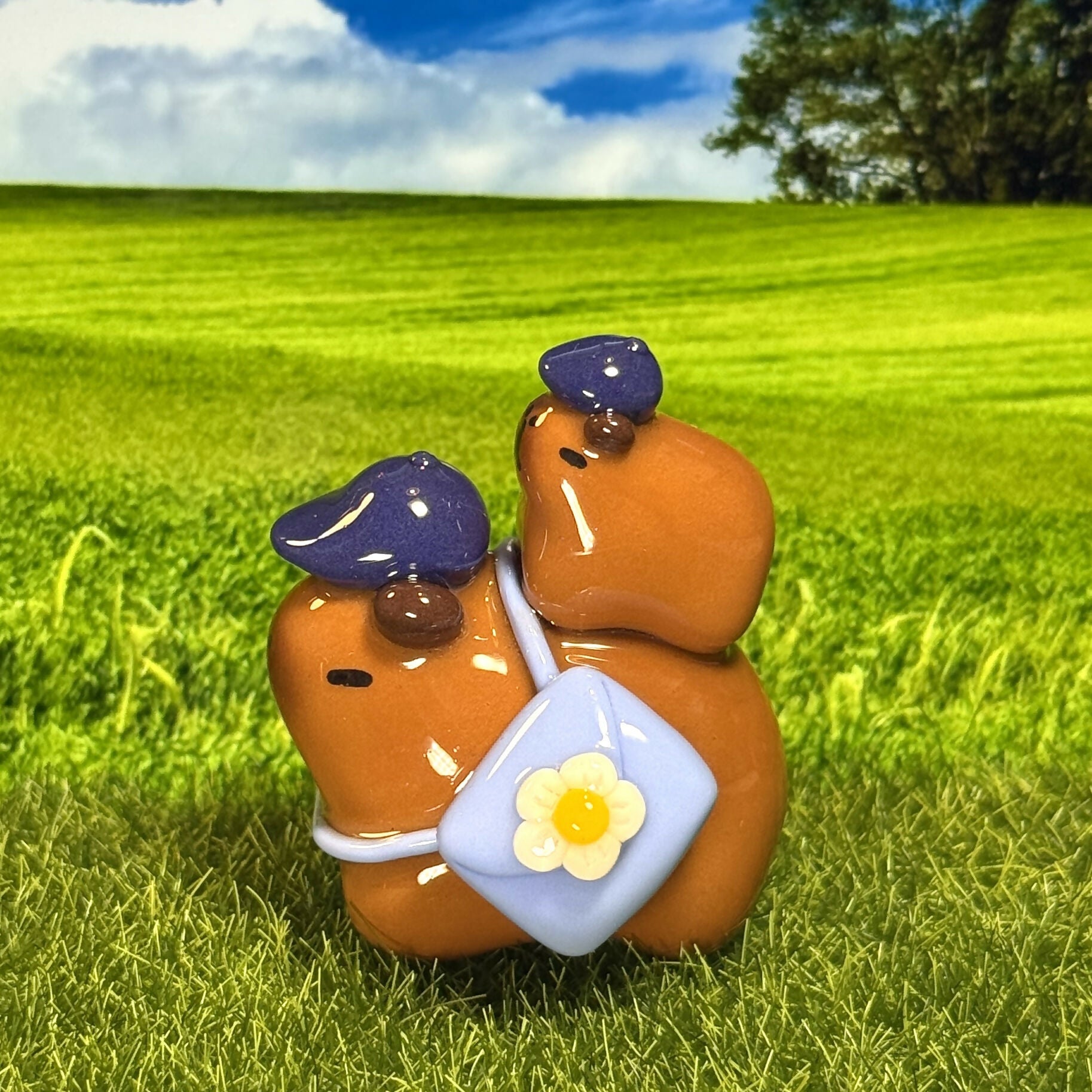Sassy Capybara Duo With Flower Bag Figure