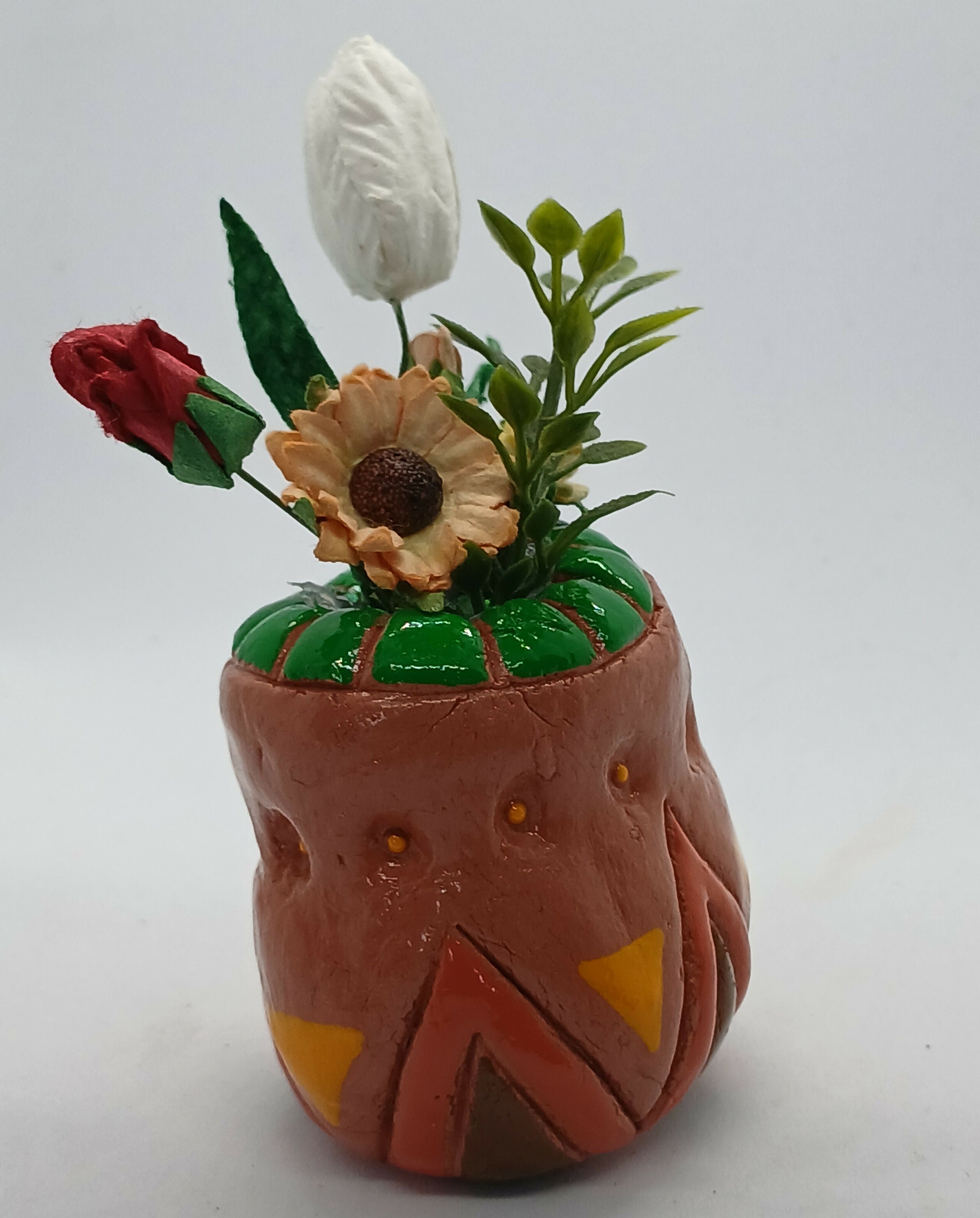 Small Clay Vase and Faux Flowers