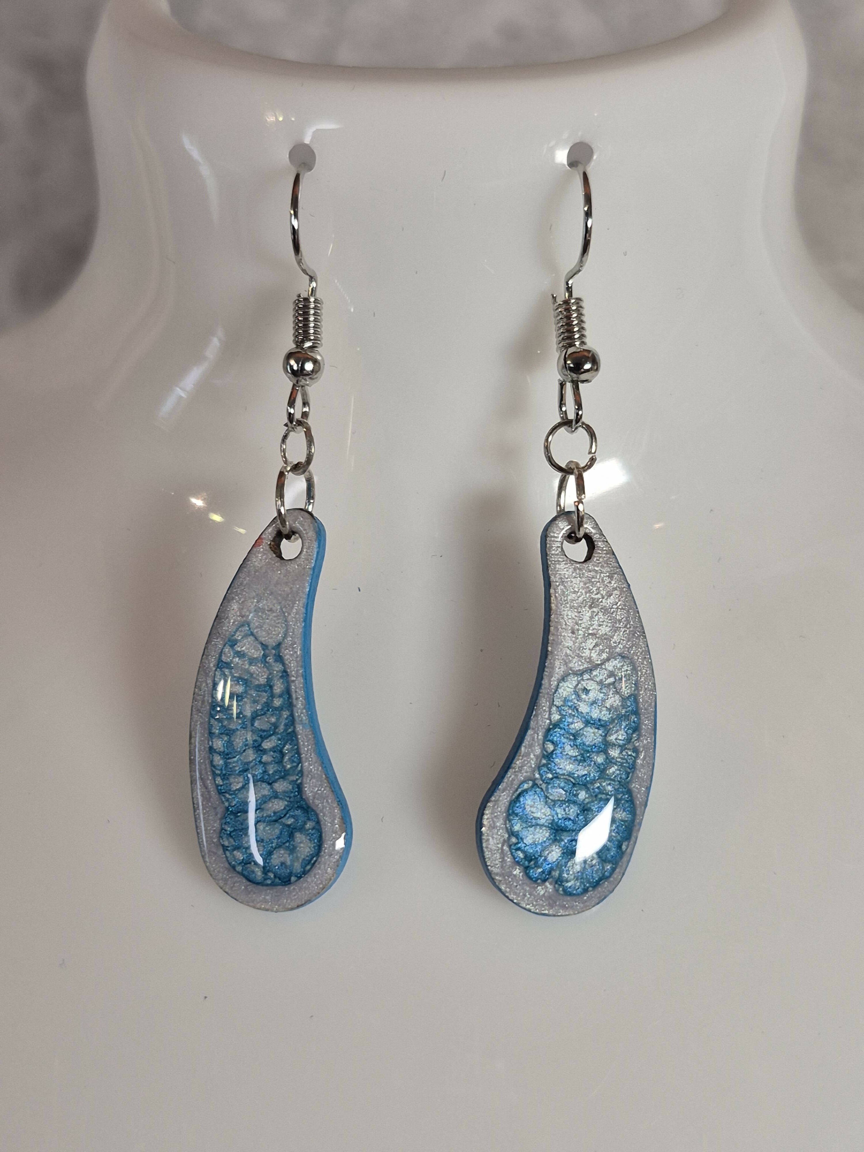 Handcrafted Teardrop Shaped Silver And Cyan Earrings