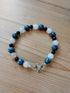 Tibetan Silver Toggle Catch Bracelet with Blue Spotted Jasper, Rose Quartz and Navy Goldstone.