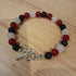 Tibetan Silver Toggle Catch Bracelet with Navy Goldstone, Red Chalcedony and Rose Quartz.