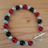 Tibetan Silver toggle Catch Bracelet with Red Chalcedony, Grey Veined Howlite & Black Faceted Onyx.