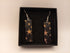 Yellow and Green Starburst Earrings On Black