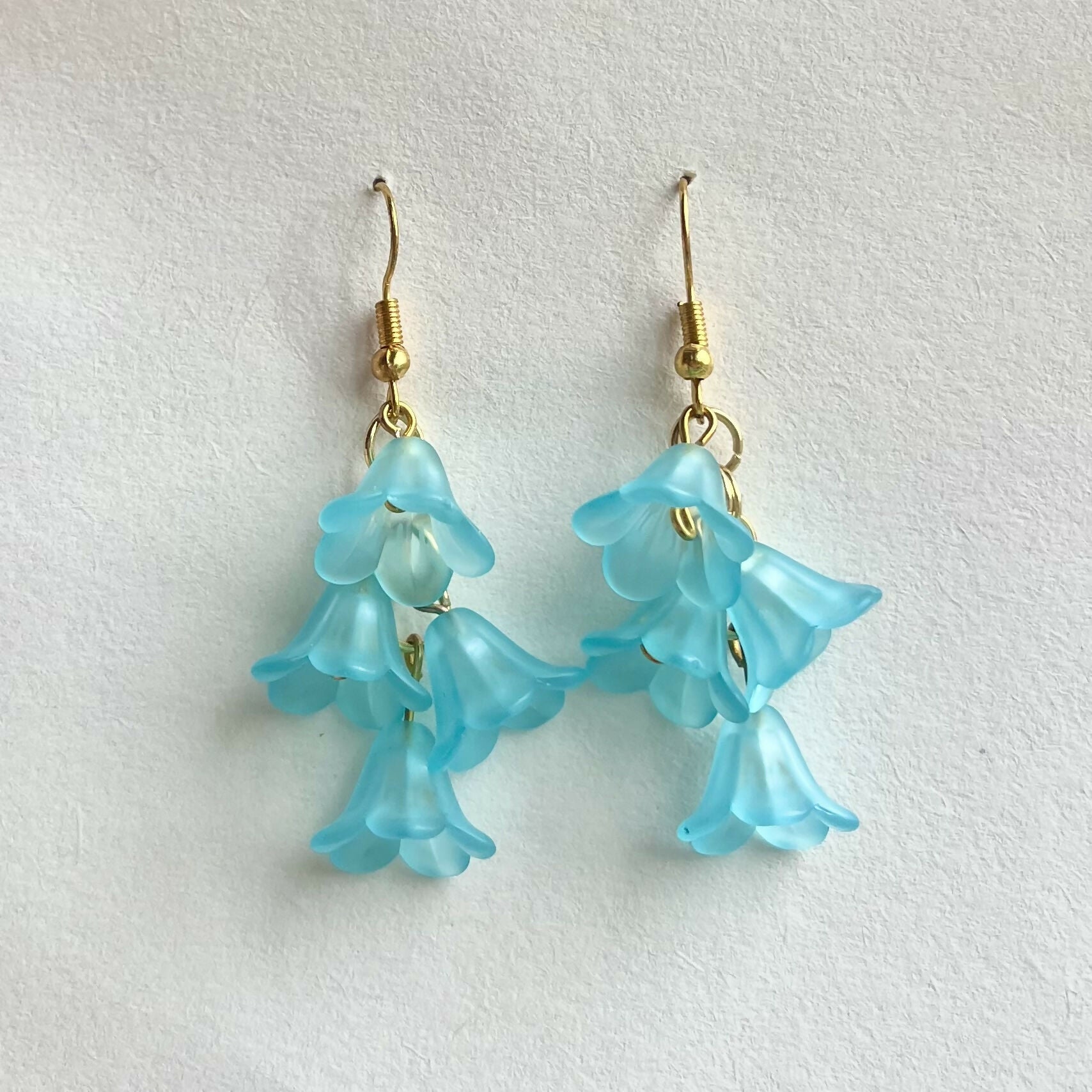 Turquoise Cascading Flower Earrings In Gold