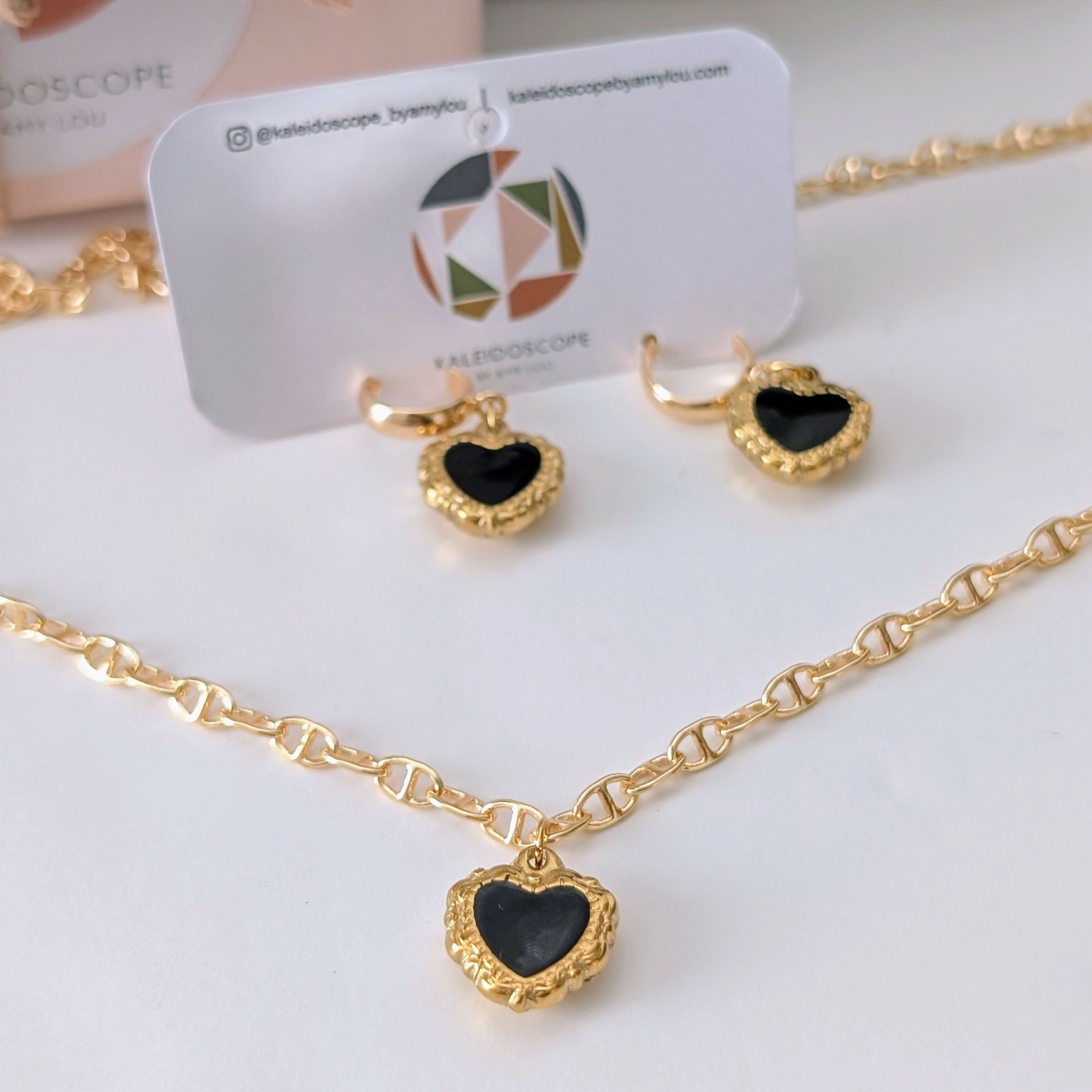 Black Enamel Gold Ornate Heart Earrings on a Gold Plated Half Loop Huggie Stud