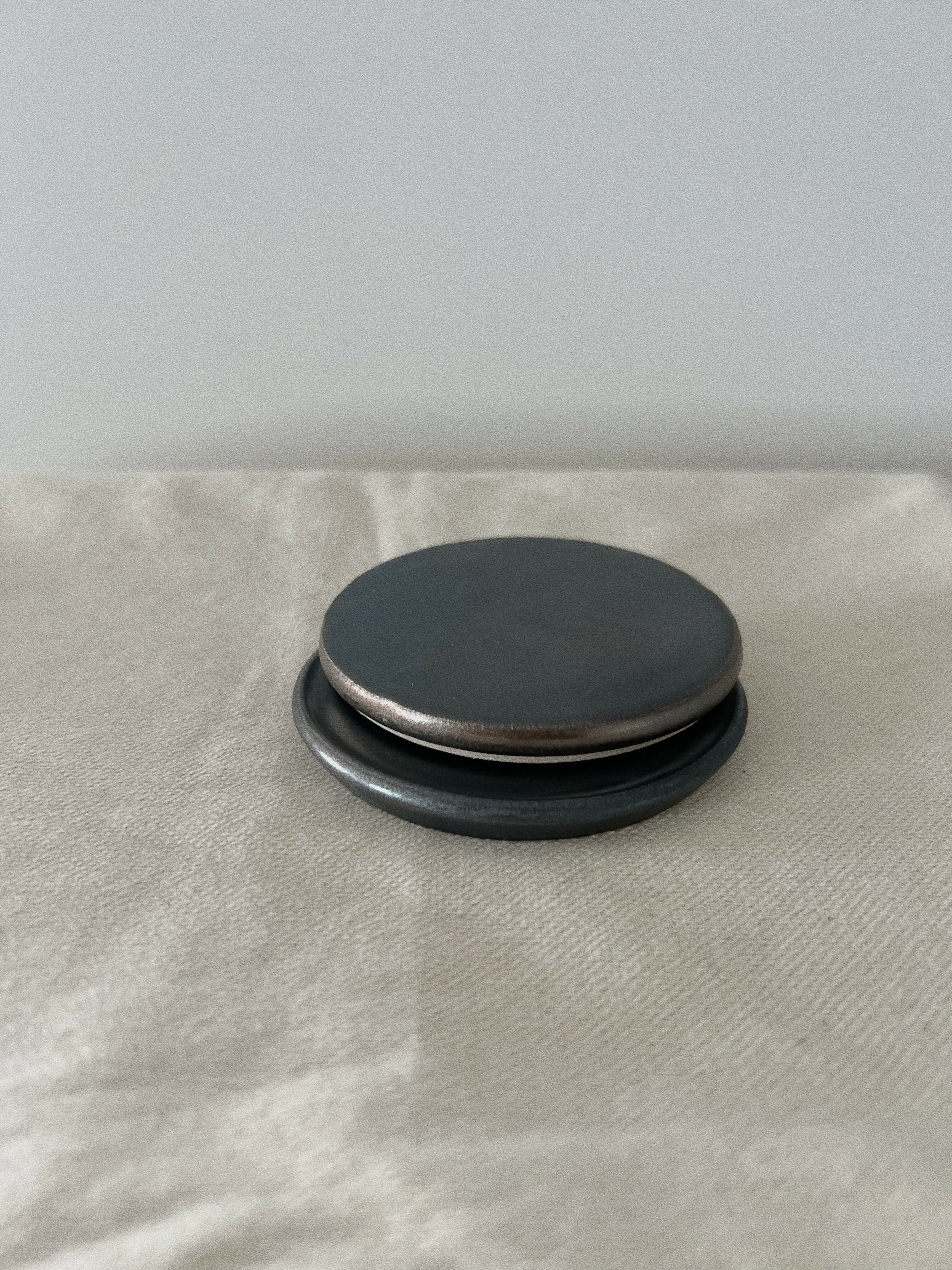 SET OF CERAMIC COASTERS