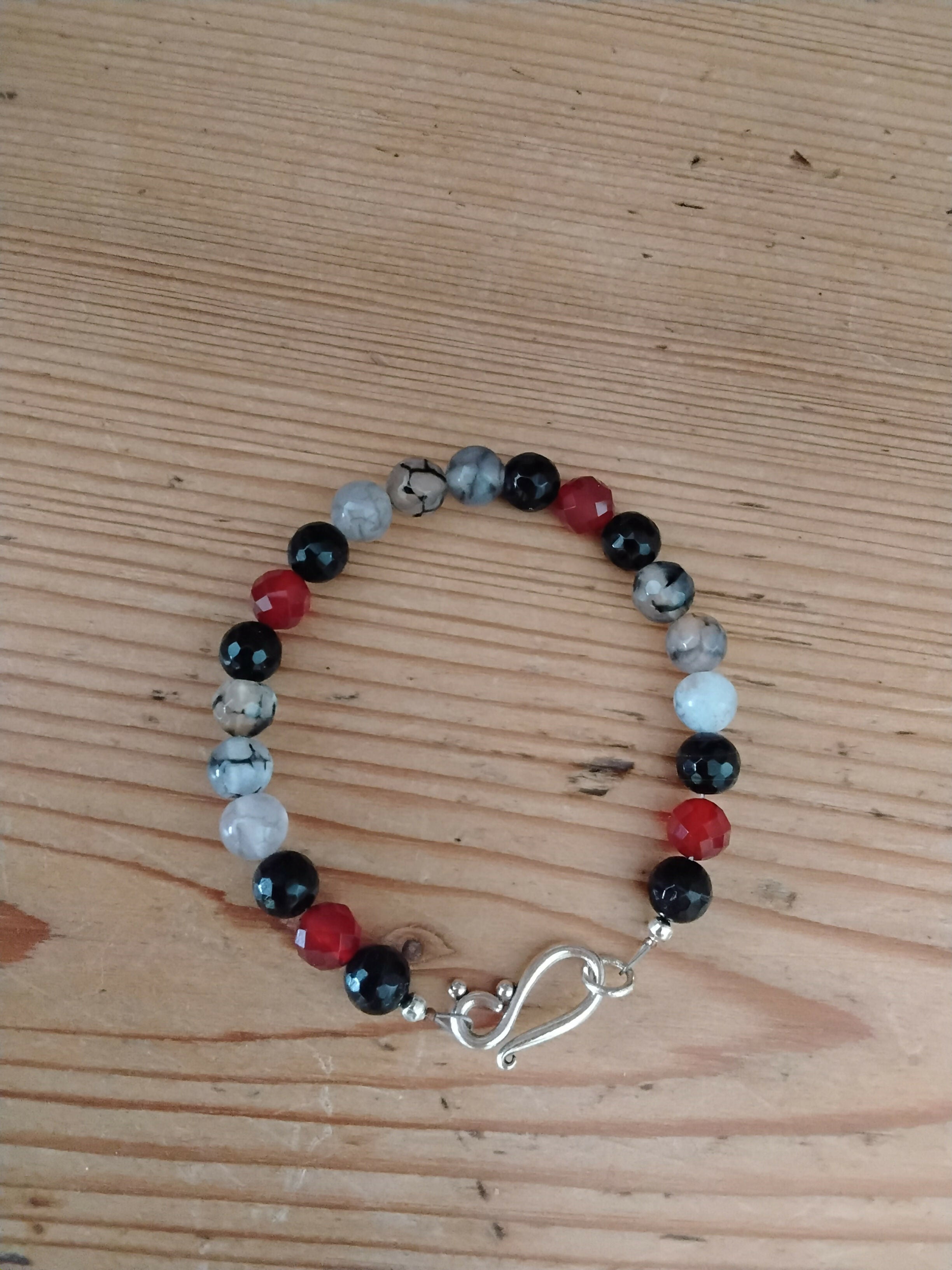 Tibetan Silver Toggle Catch Bracelet with Faceted Black Onyx, Faceted Carnelian and Dragon Vein Fire Agate.