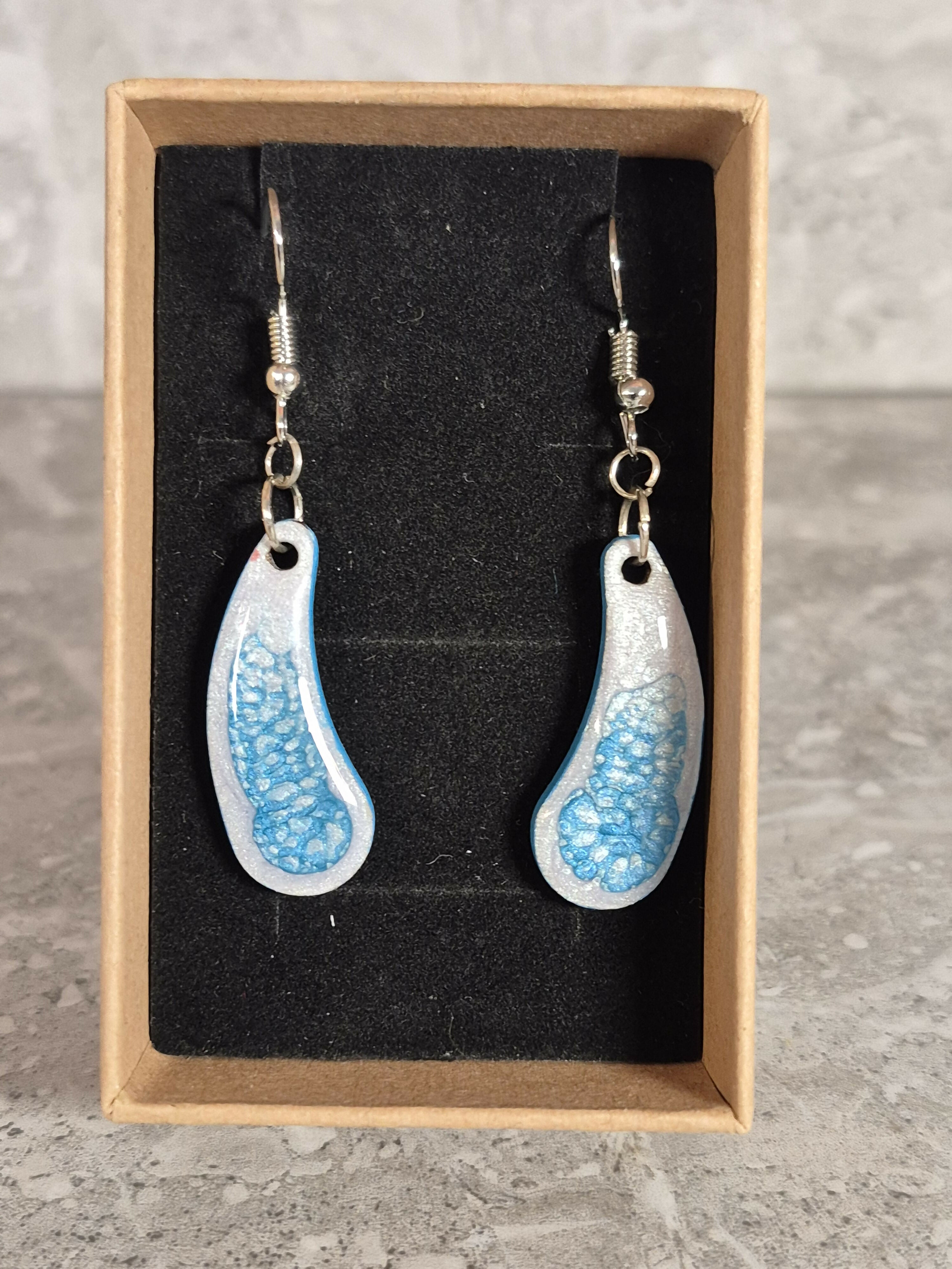 Handcrafted Teardrop Shaped Silver And Cyan Earrings