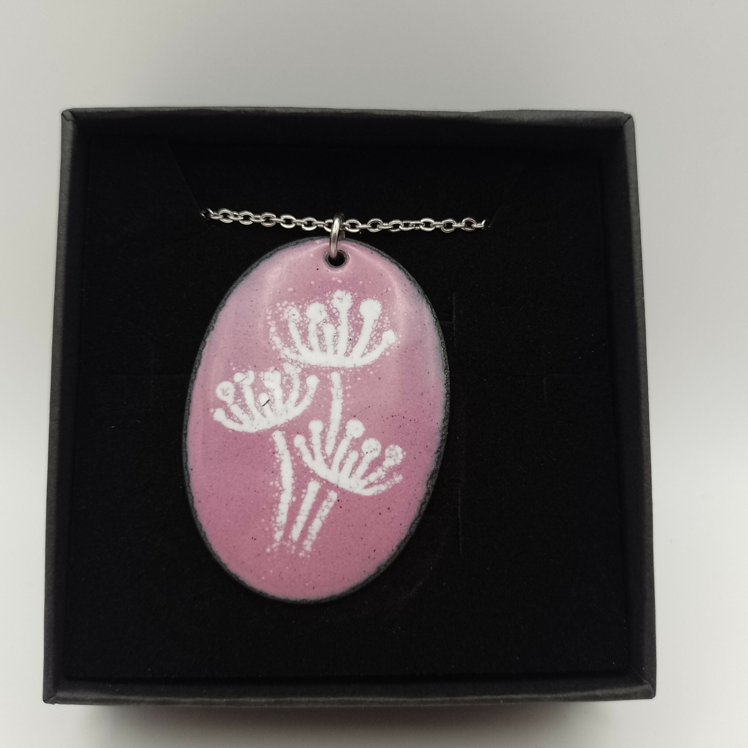 Pink Enamel Pendant With White Flower