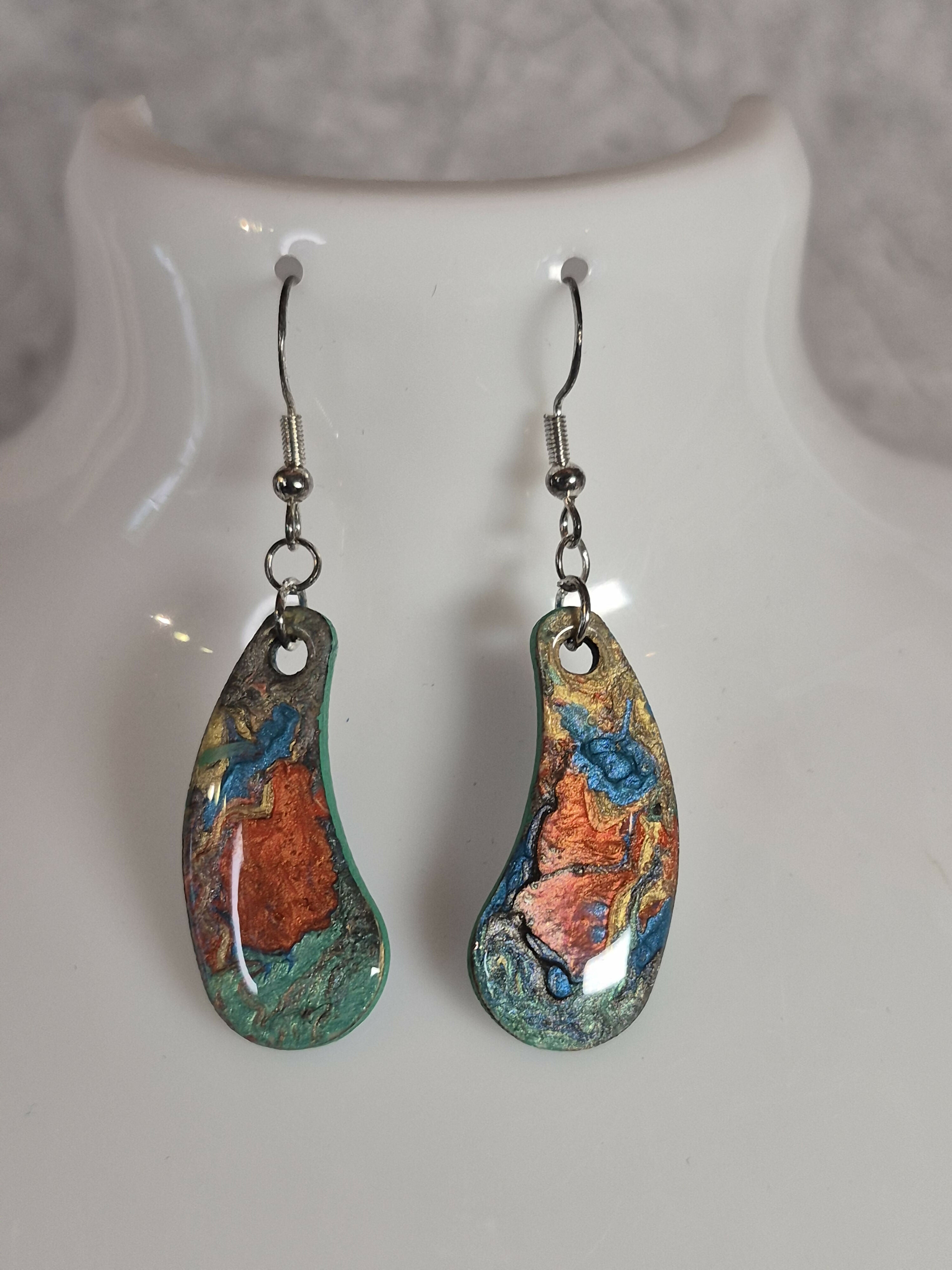 Handcrafted teardrop shaped multicoloured earrings.