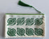 Hand Printed Zip Pouch with Green Snail Design.