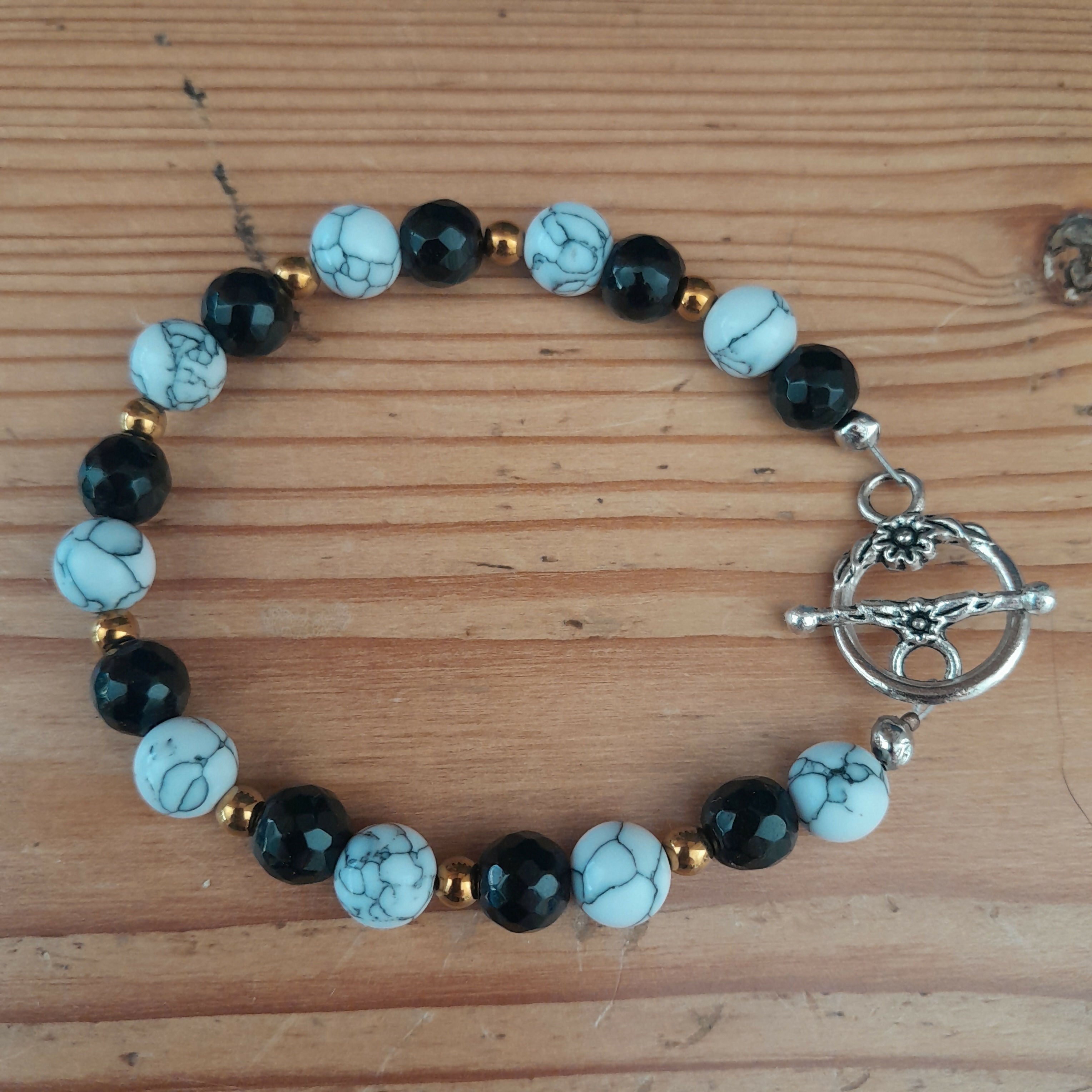 Tibetan Silver Toggle Catch Bracelet with Veined Howlite, Faceted Onyx and Copper Hematite