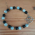 Tibetan Silver Toggle Catch Bracelet with Veined Howlite, Faceted Onyx and Copper Hematite