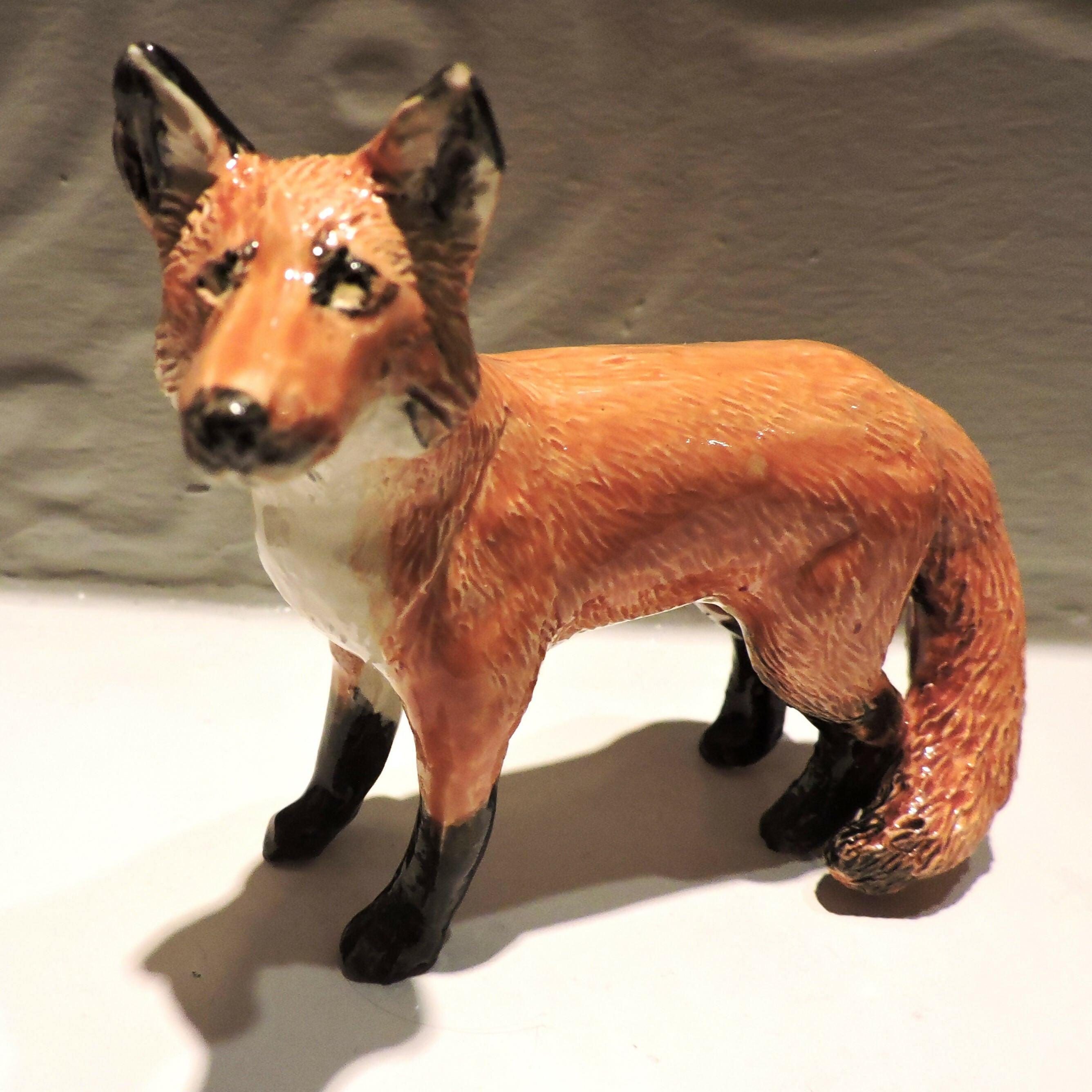 Ceramic standing fox sculpture
