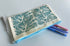 Hand printed Zip Pouch with Blue Flying Bird Design.