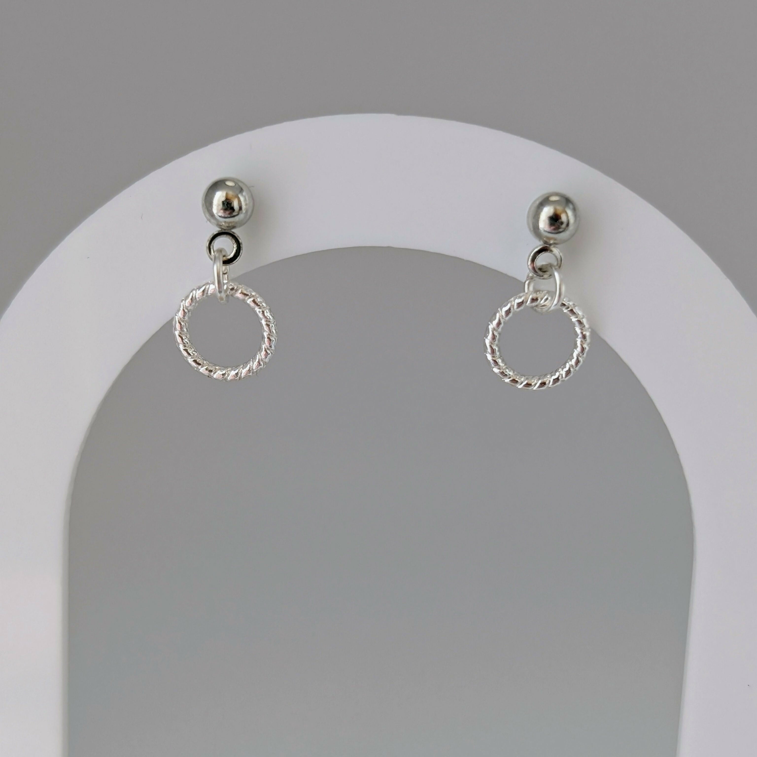 Tiny Silver Minimalist Circle Earrings in Rope Twist Style on a Silver Plated Stud