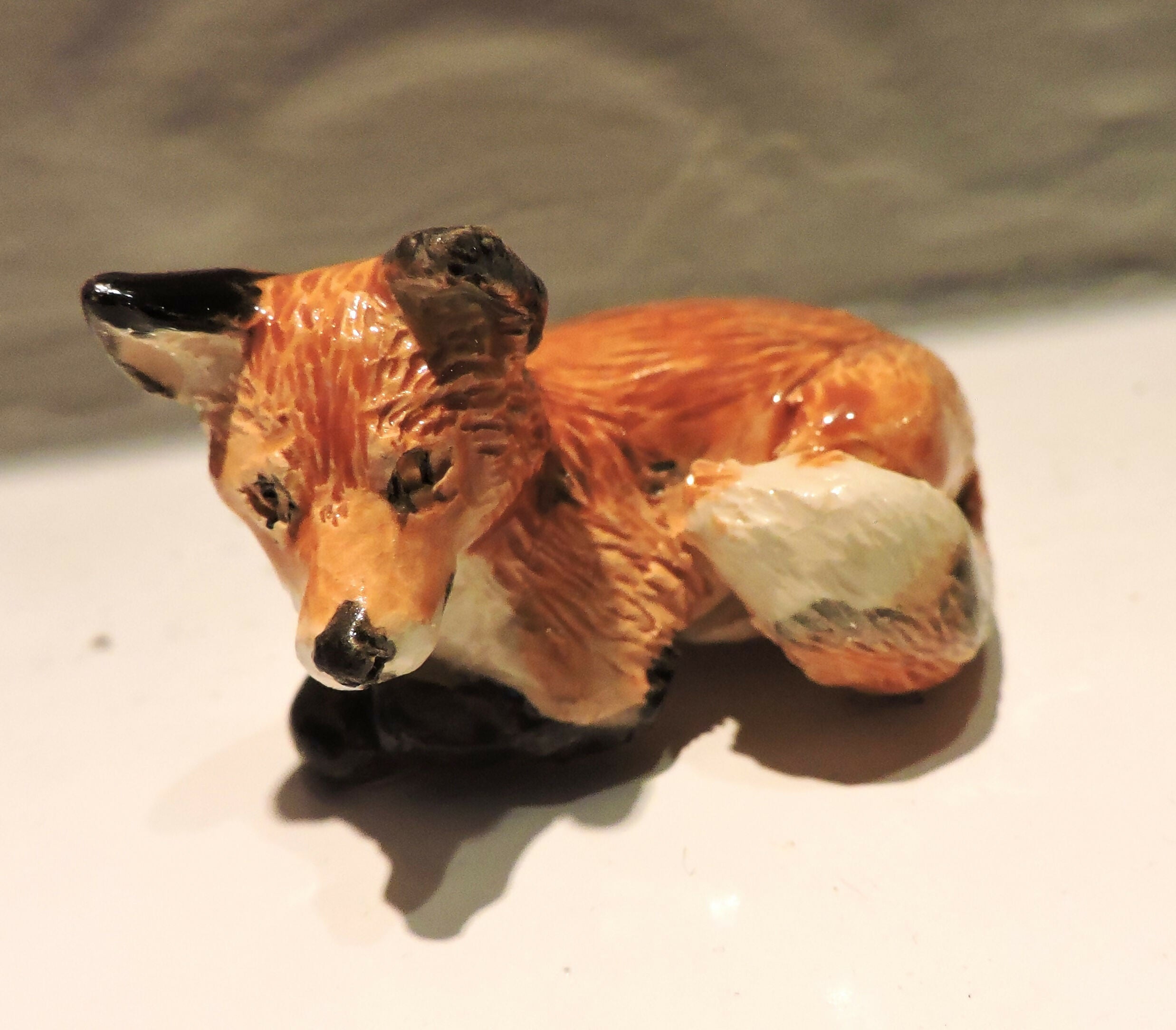 Ceramic Comfy fox sculpture