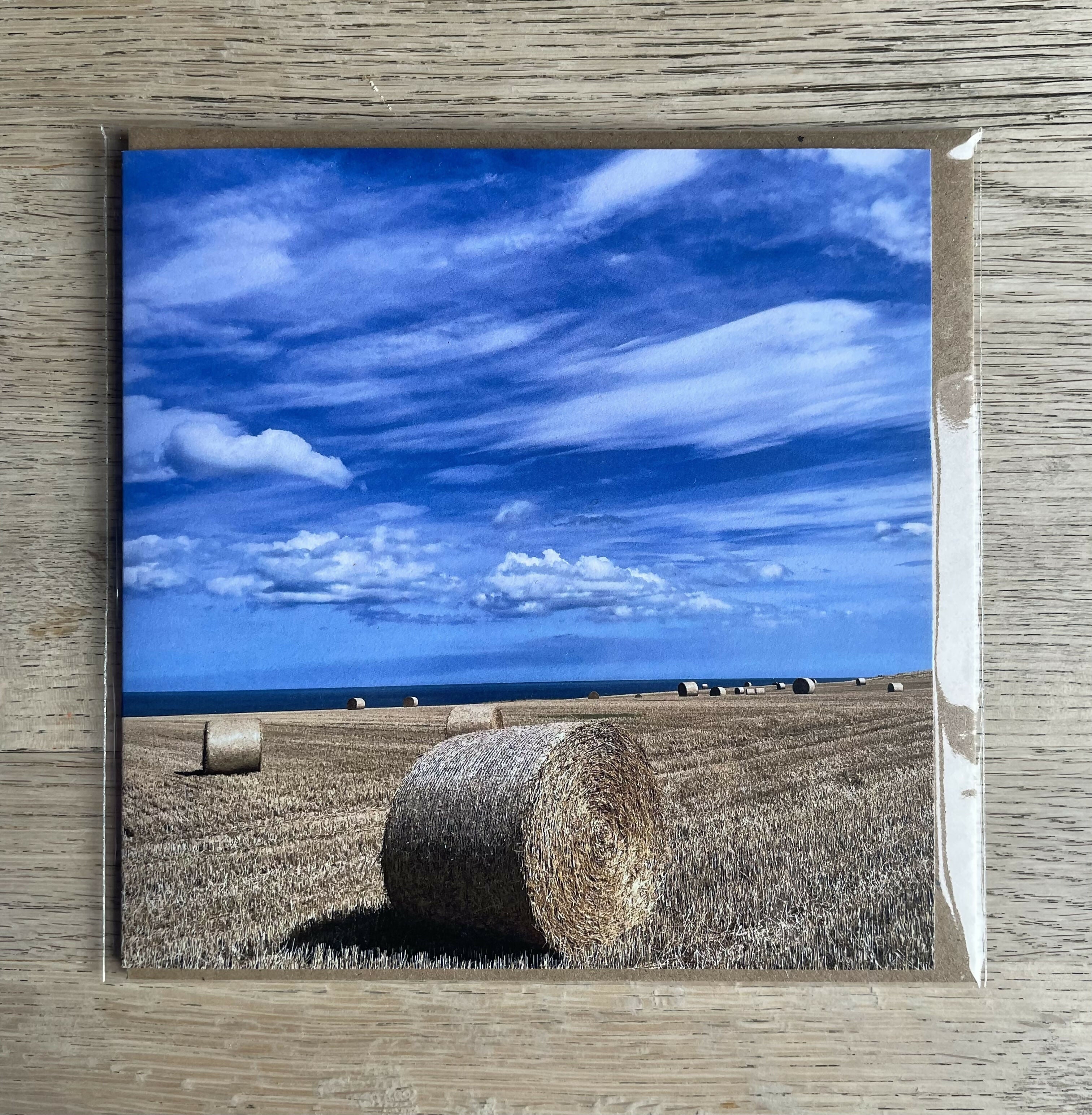Clouds Above A Field At Harvest Time – Square Greetings Card