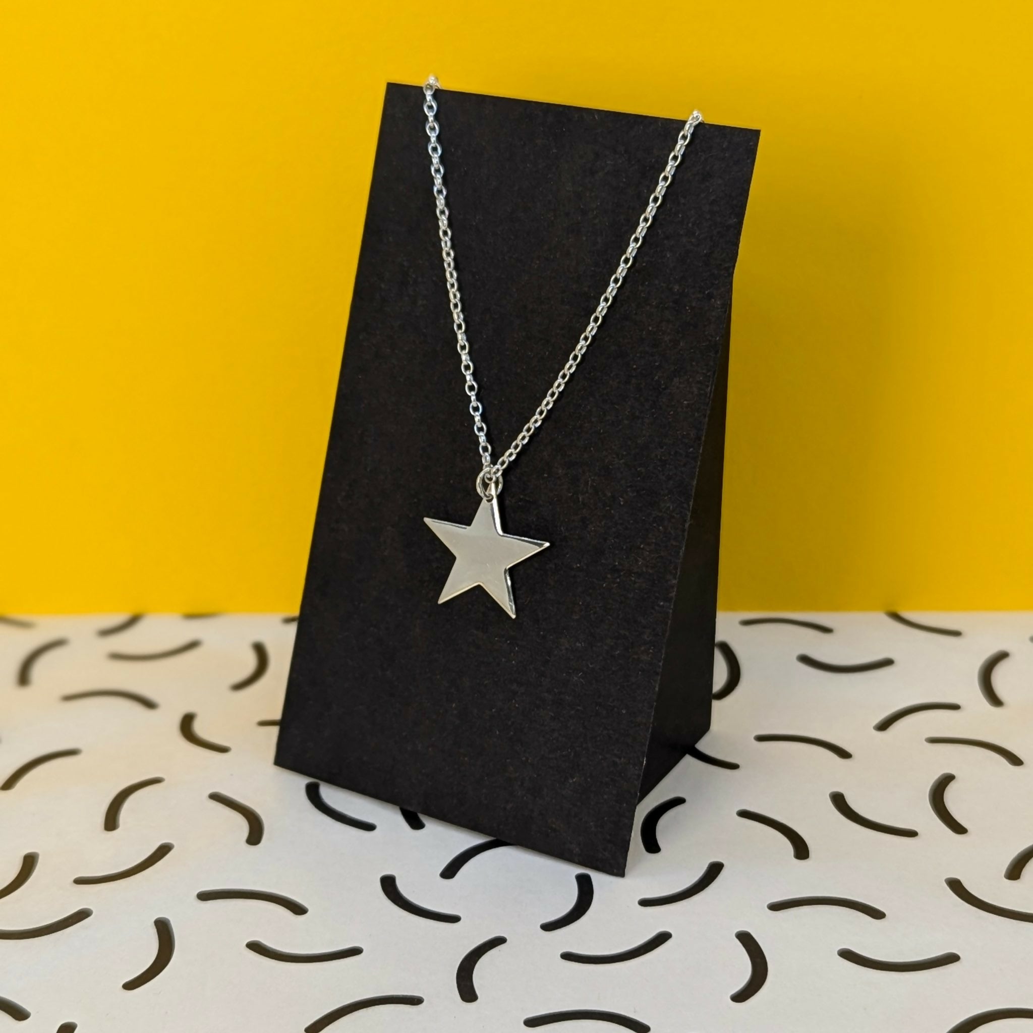 ‘Fallen Star’ Sterling Silver Small Polished Star Pendant