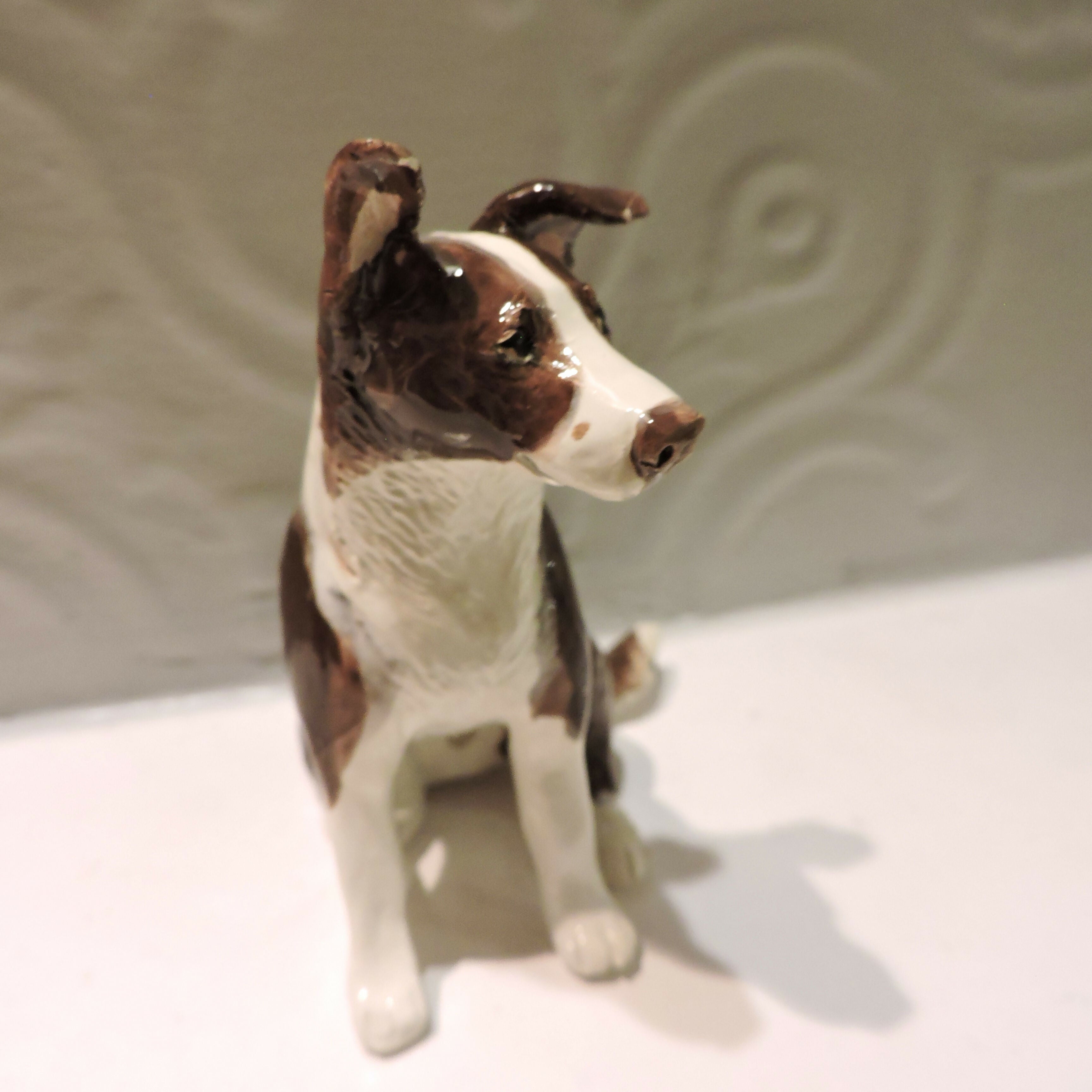 Ceramic red Shorthaired border collie dog sculpture